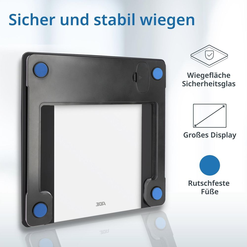 Eine schwarze Personenwaage mit blauem Akzent, Sicherheitsglas und großem Display.