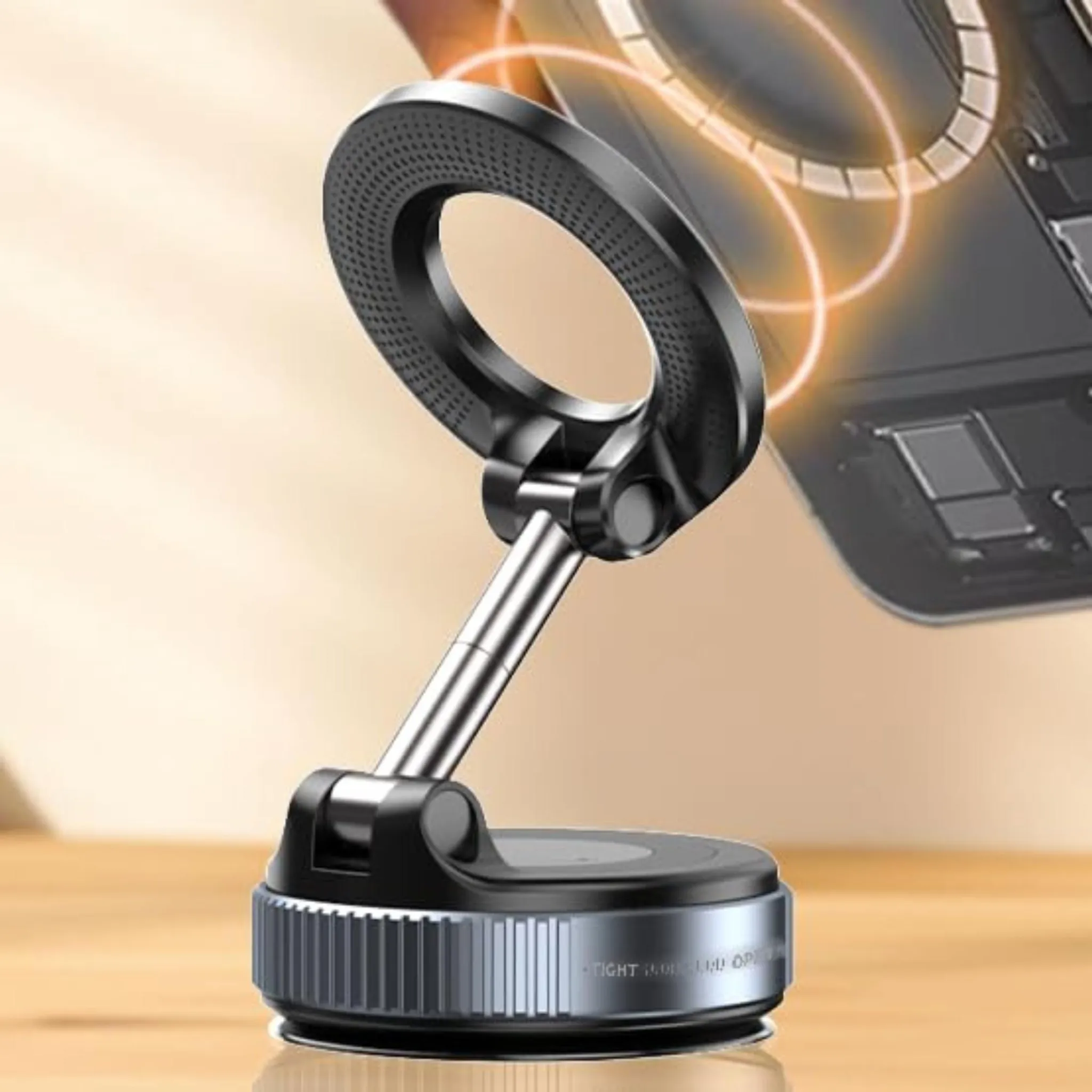 Schwarzer magnetischer Handyringhalter mit silbernem Arm auf Holzoberfläche.