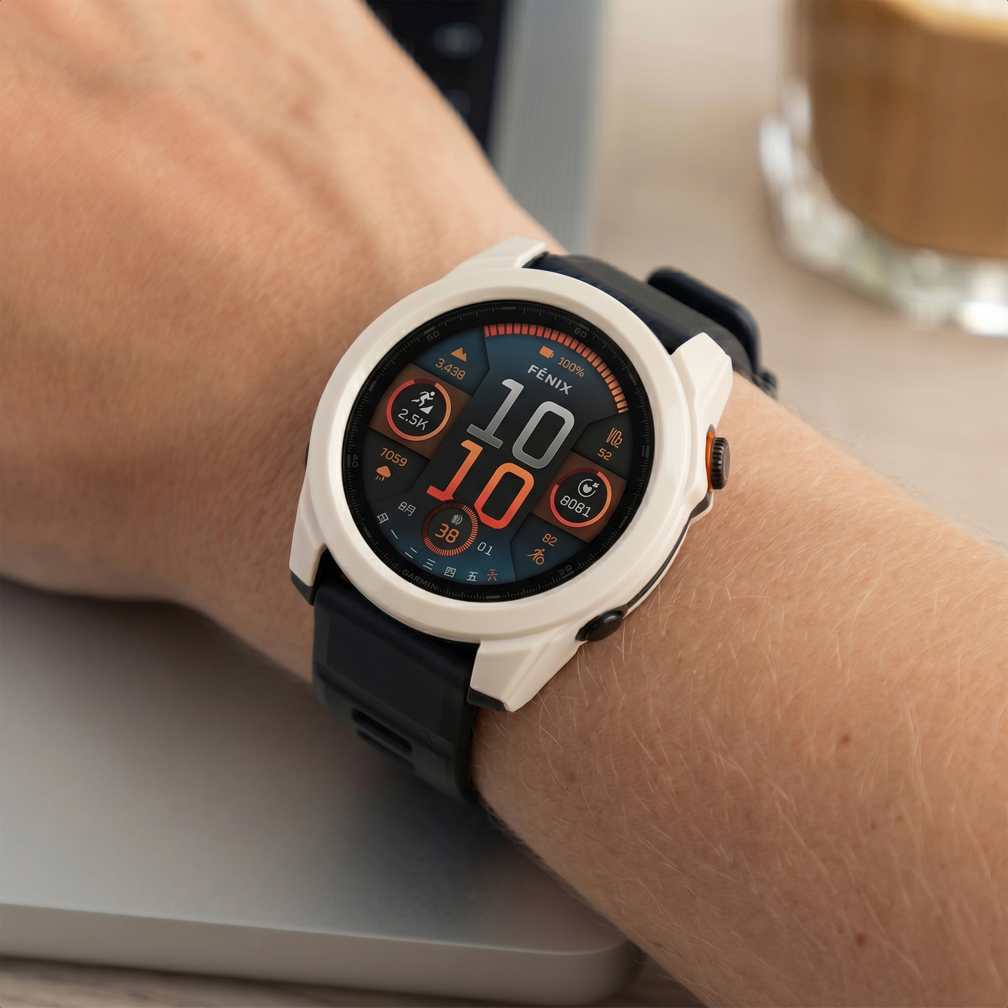 A white smartwatch with a black band displays sports data.
