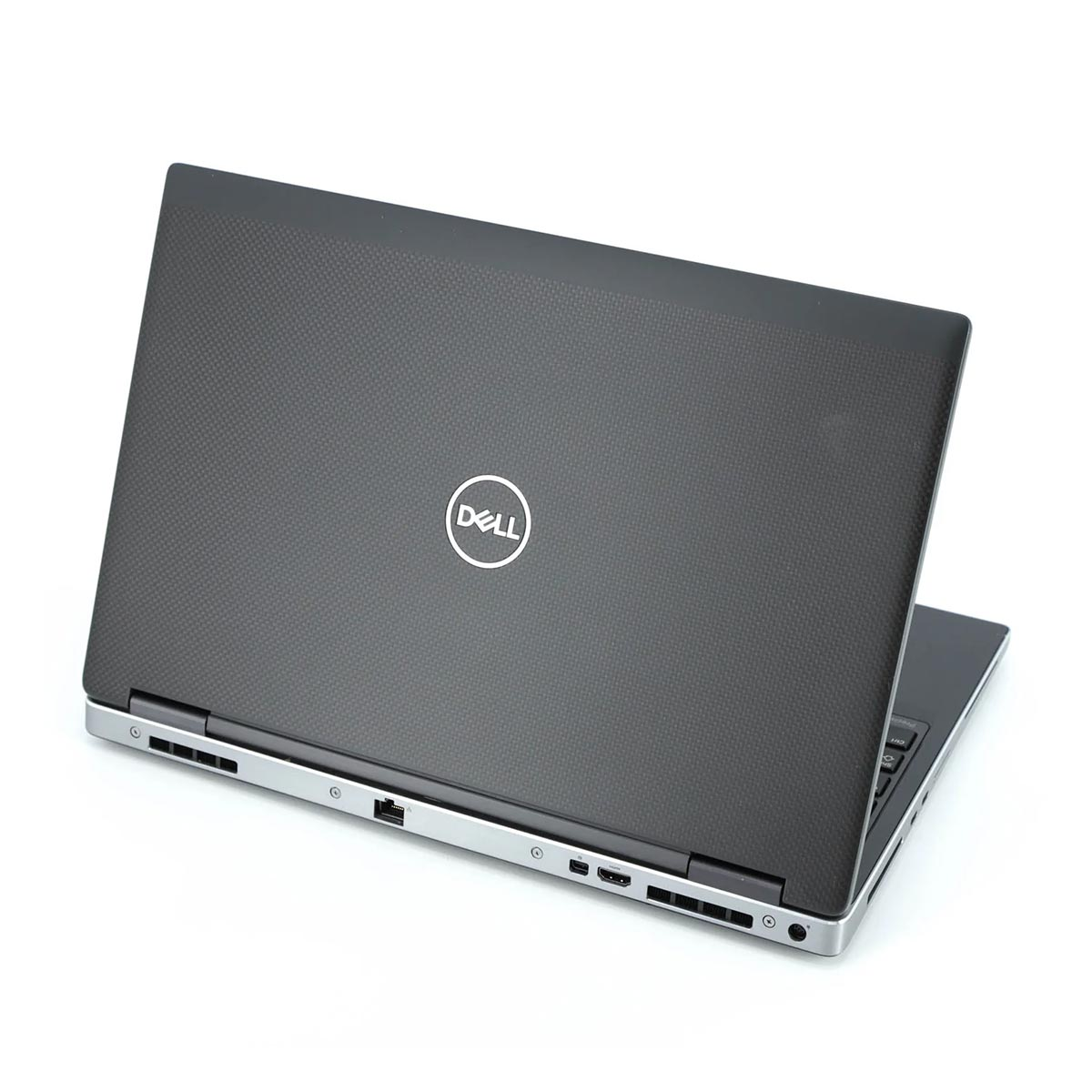 Zamknięty czarny laptop Dell z wygrawerowanym logo Dell na pokrywie.