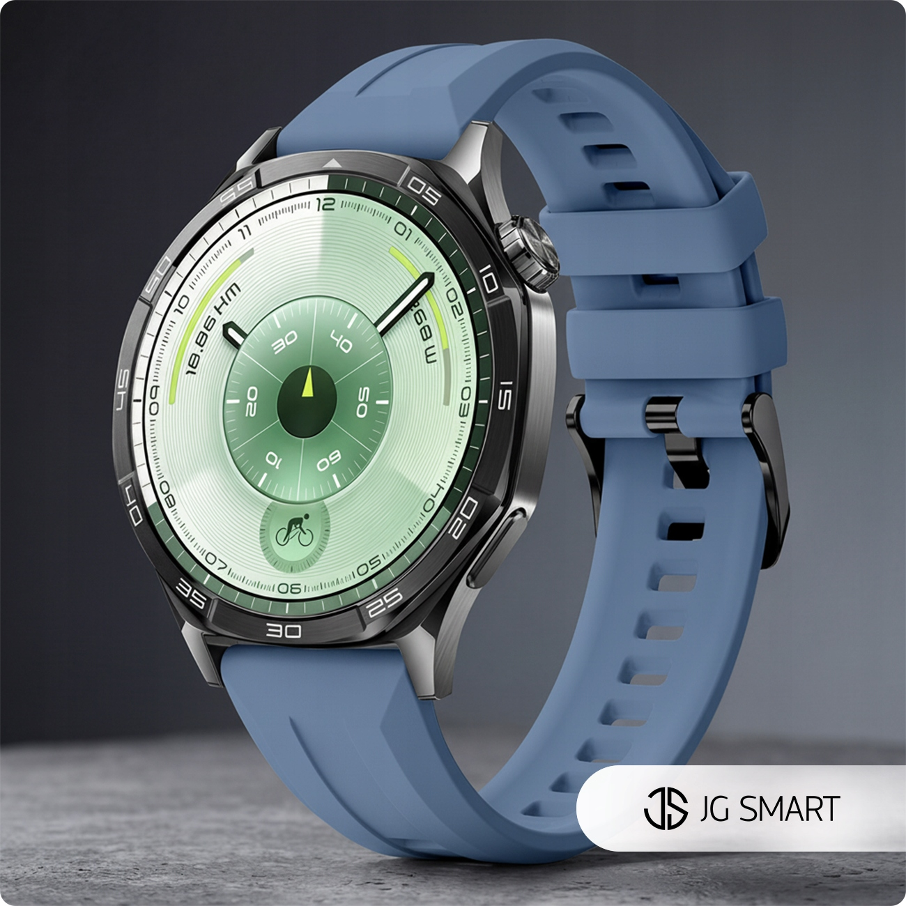 Niebieski smartwatch ze srebrną kopertą i zieloną tarczą na szarym tle.