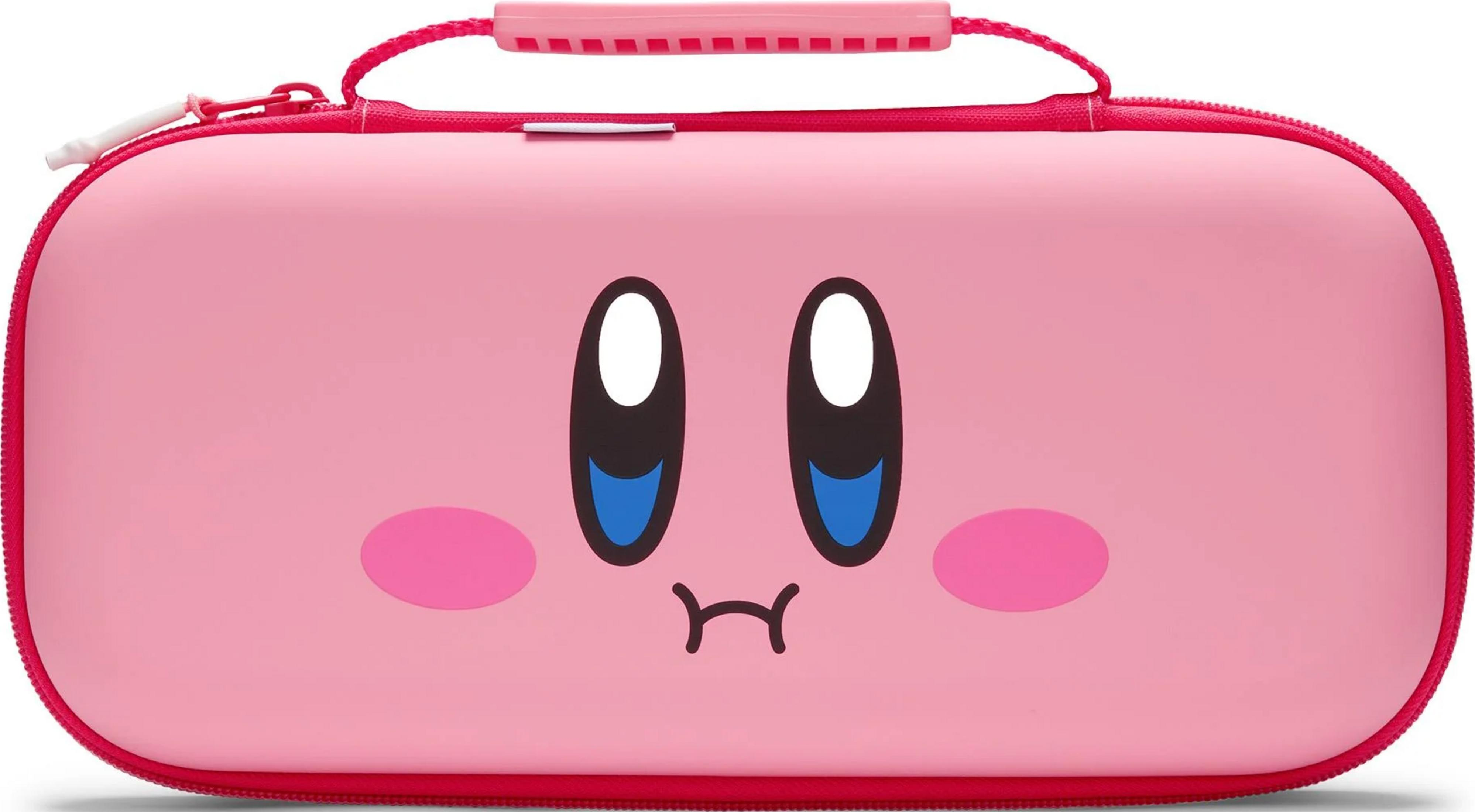 Różowa torba z twarzą Kirby'ego, czerwonym zamkiem i uchwytem.