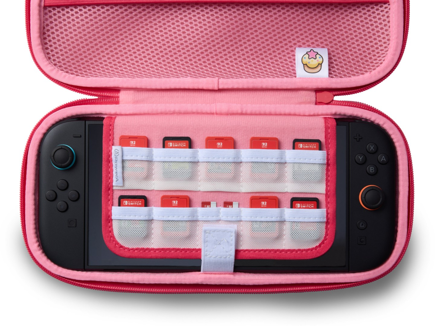 Otwarty różowy futerał na Nintendo Switch z konsolą i 10 grami.