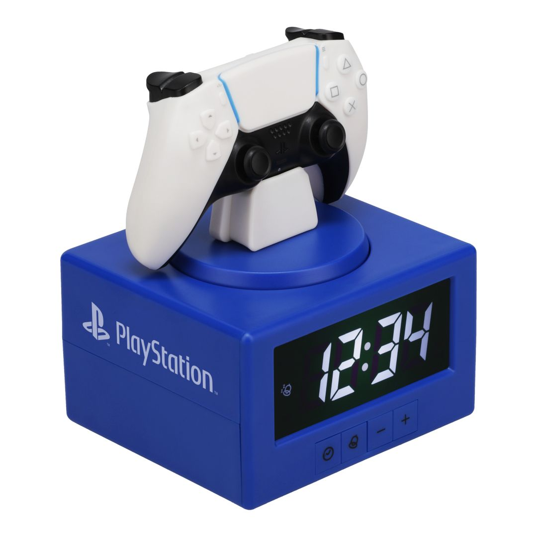 Niebieski zegar PlayStation z białym kontrolerem na górze. Wyświetla 12:34.