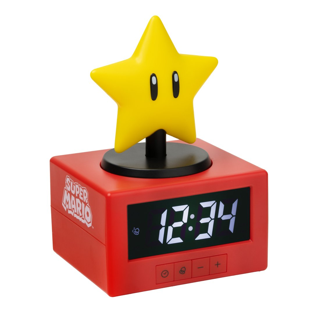 Czerwony budzik Super Mario z żółtą gwiazdą z oczami.