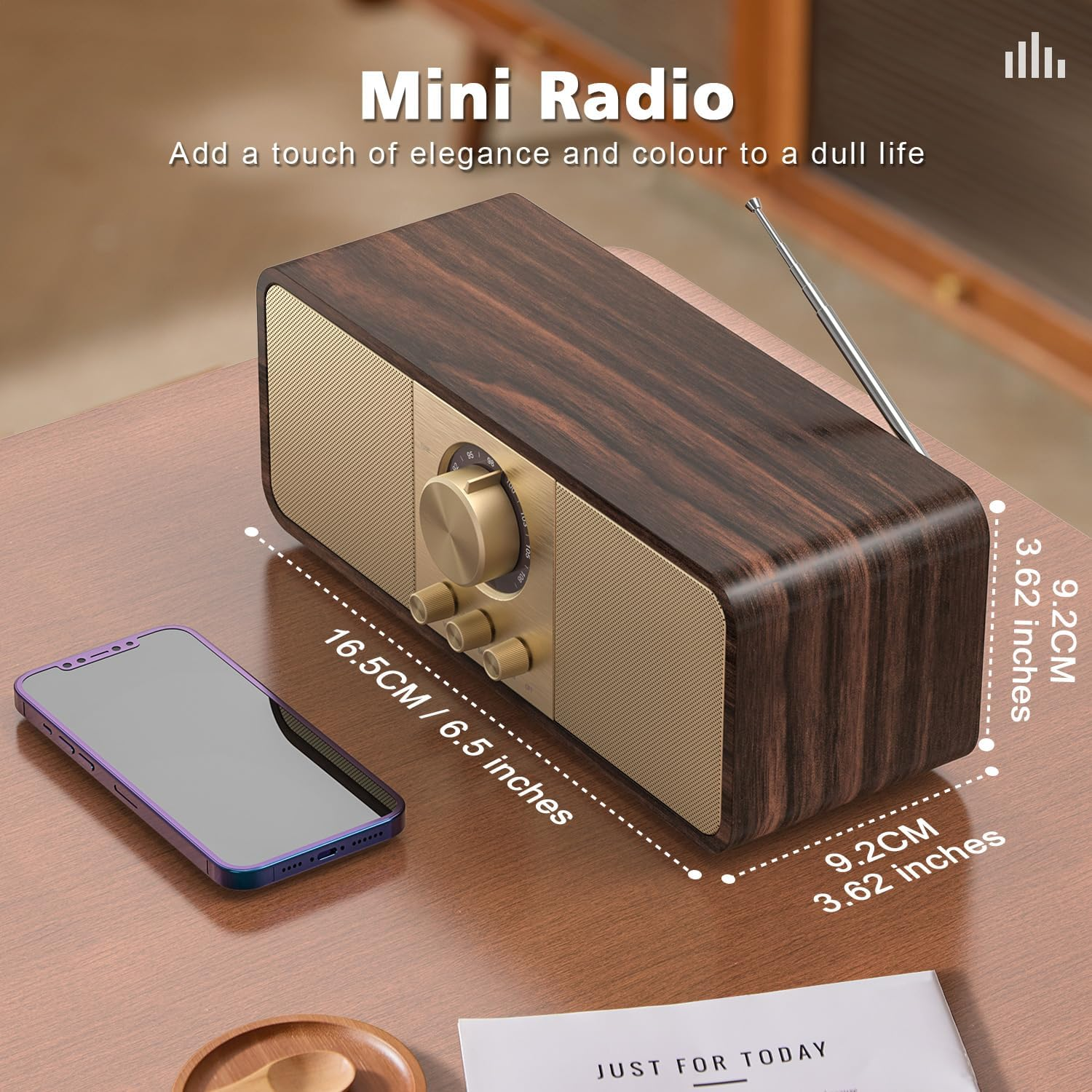 Holzradio mit ausfahrbarer Antenne und Smartphone daneben.