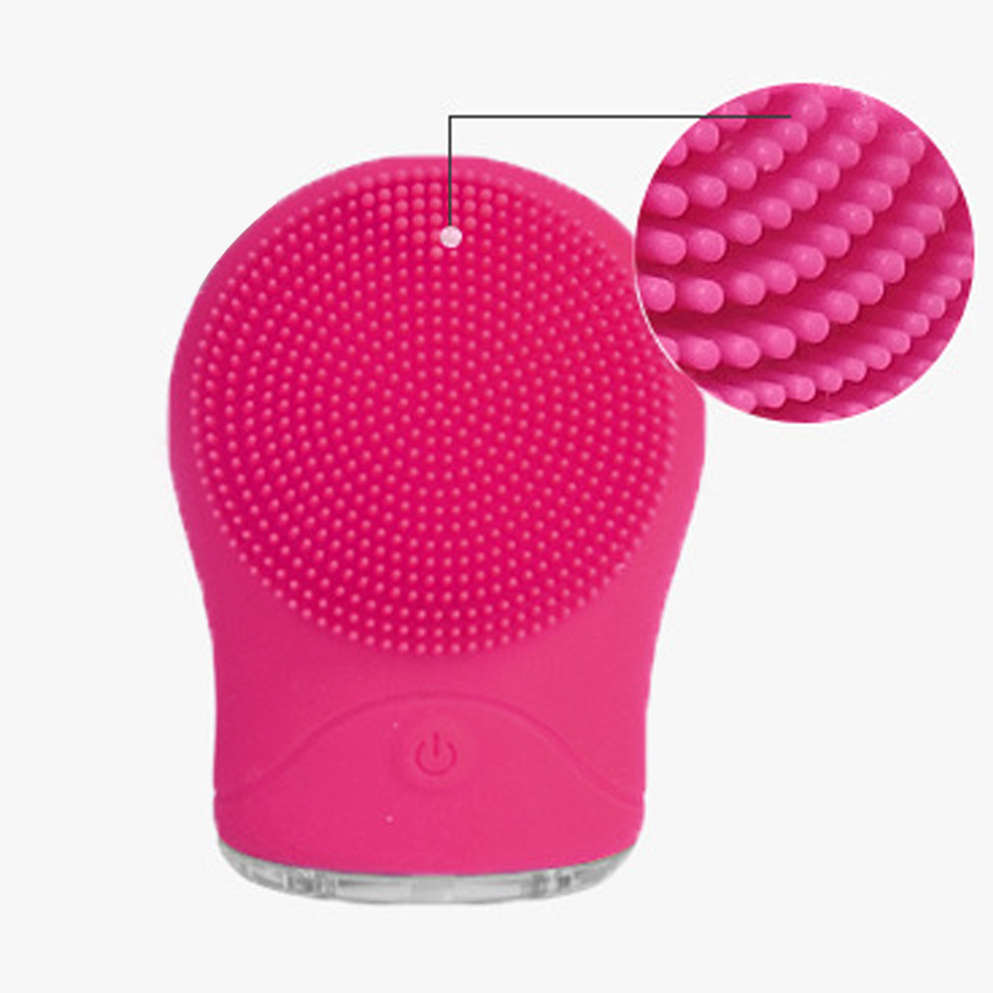 Ein pinker Gesichtsreiniger mit Silikonborsten und einem Power-Knopf.
