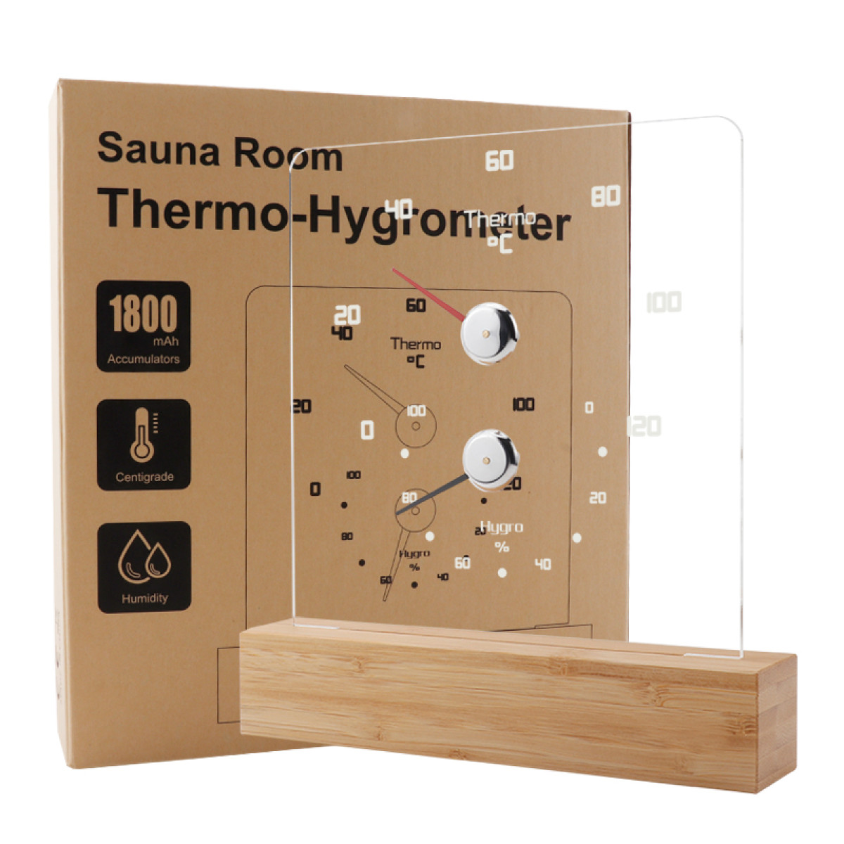 Ein Thermo-Hygrometer für die Sauna auf einem Holzsockel, daneben die Verpackung.