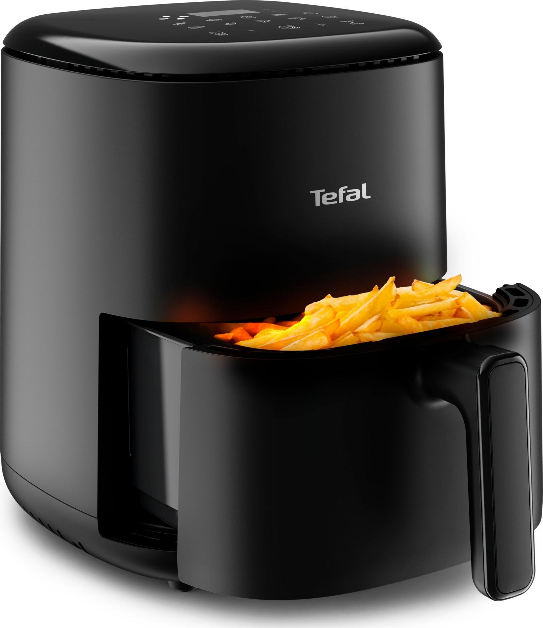 Friggitrice ad aria Tefal nera con patatine fritte croccanti nel cestello.