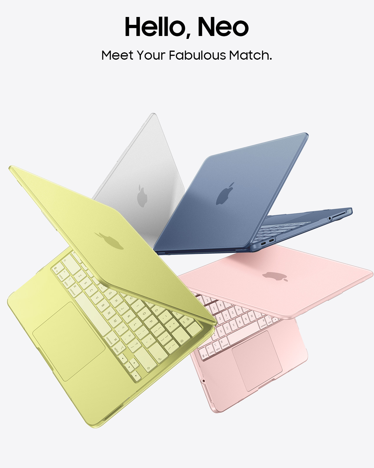 Vier Laptops in Gelb, Blau, Rosa und Weiß liegen nebeneinander.