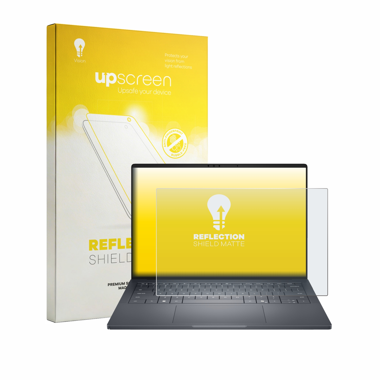 Ein Laptop mit einer Schutzfolie und einer gelben Verpackung daneben.
