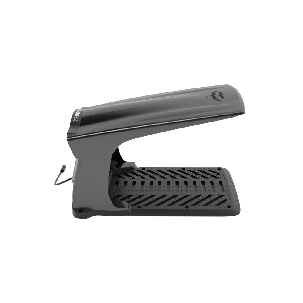 A gray, futuristic device with a wide, perforated base and a slanted top section.