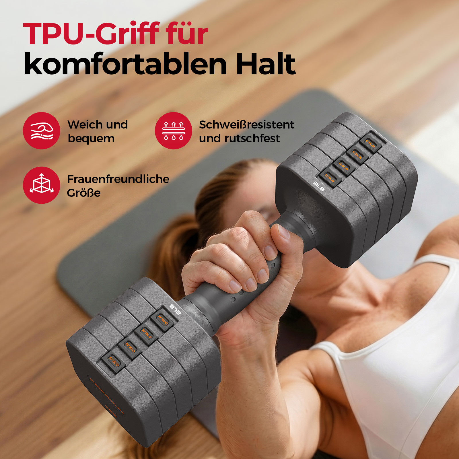 Eine Frau hält eine verstellbare Hantel mit TPU-Griff. Die Hantel liegt auf einer Matte.