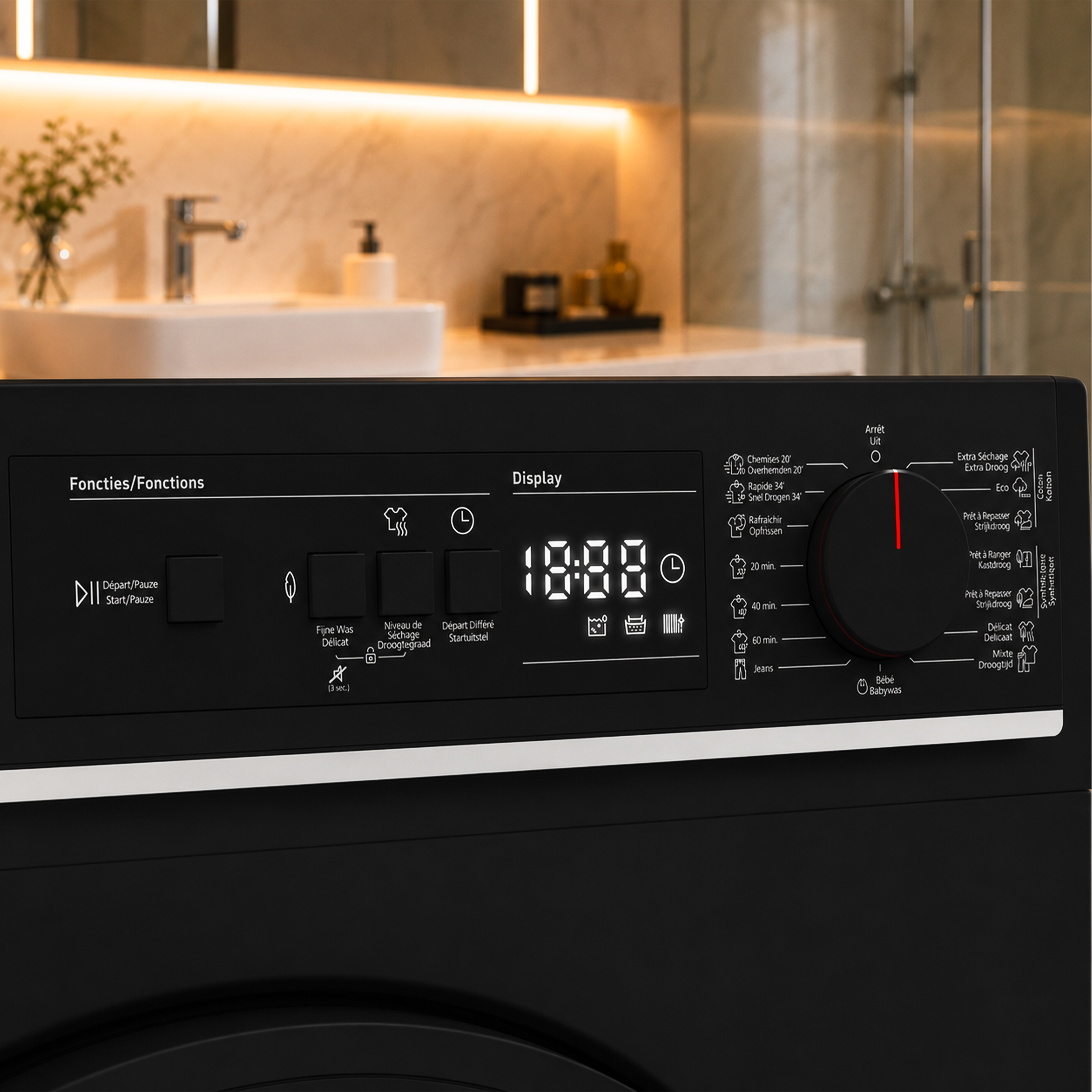 Close-up of a black dryer control panel with digital displays and a dial.