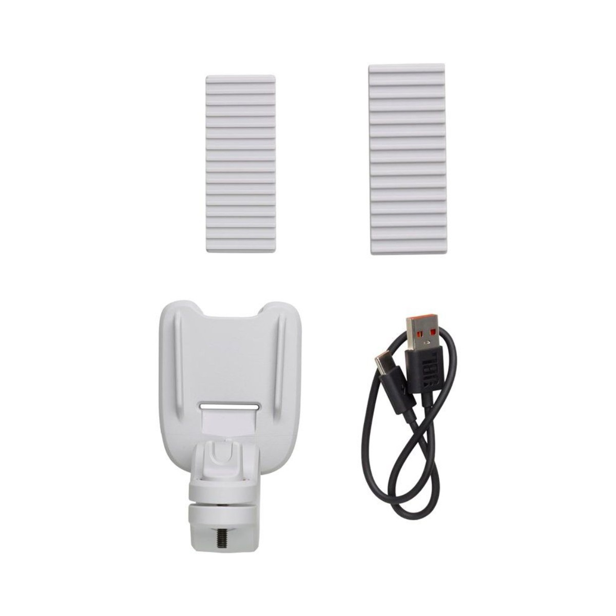 Due strisce bianche scanalate, un supporto bianco e un cavo USB nero con connettore arancione.