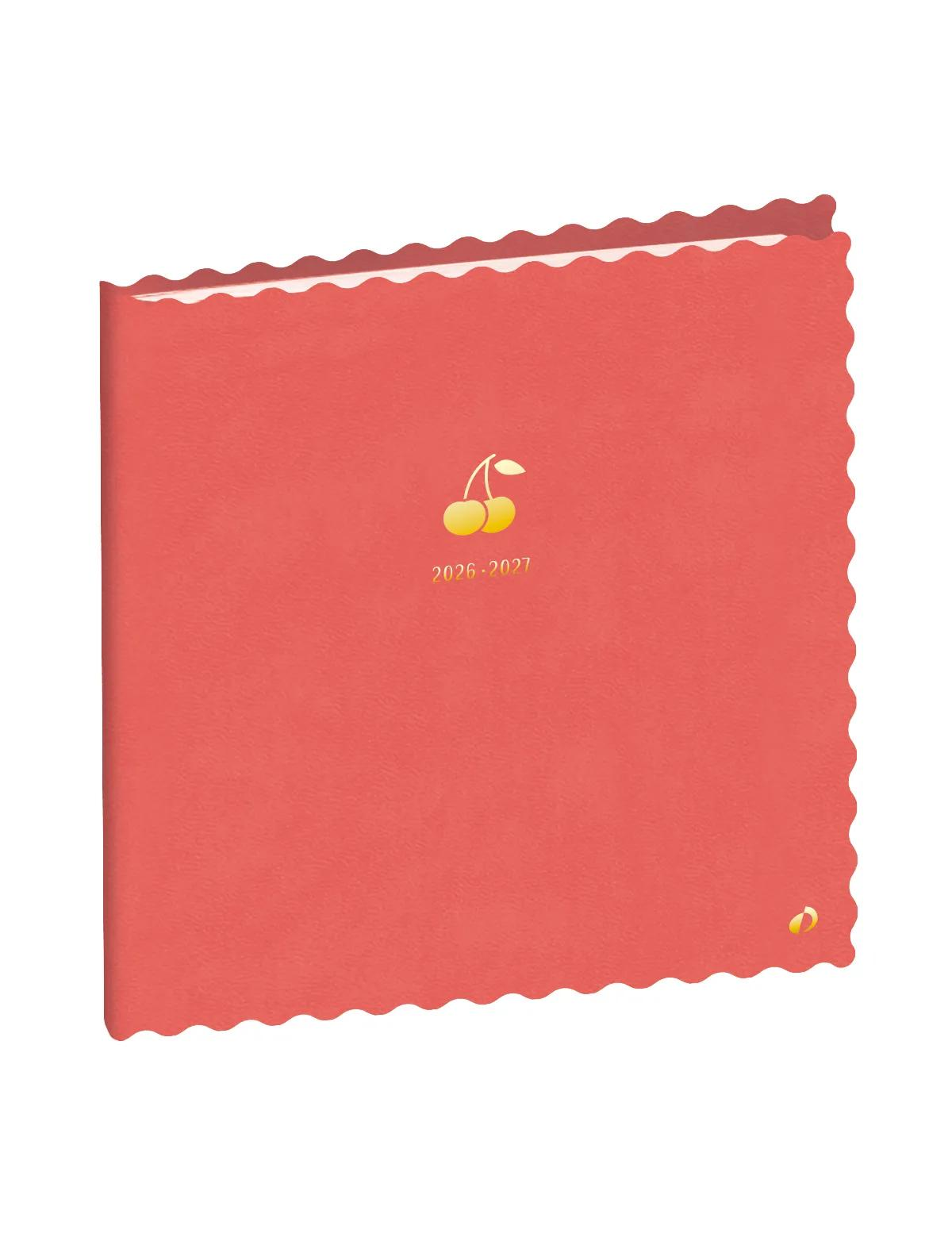 Cuaderno rojo con símbolo de cereza y años 2026-2027.