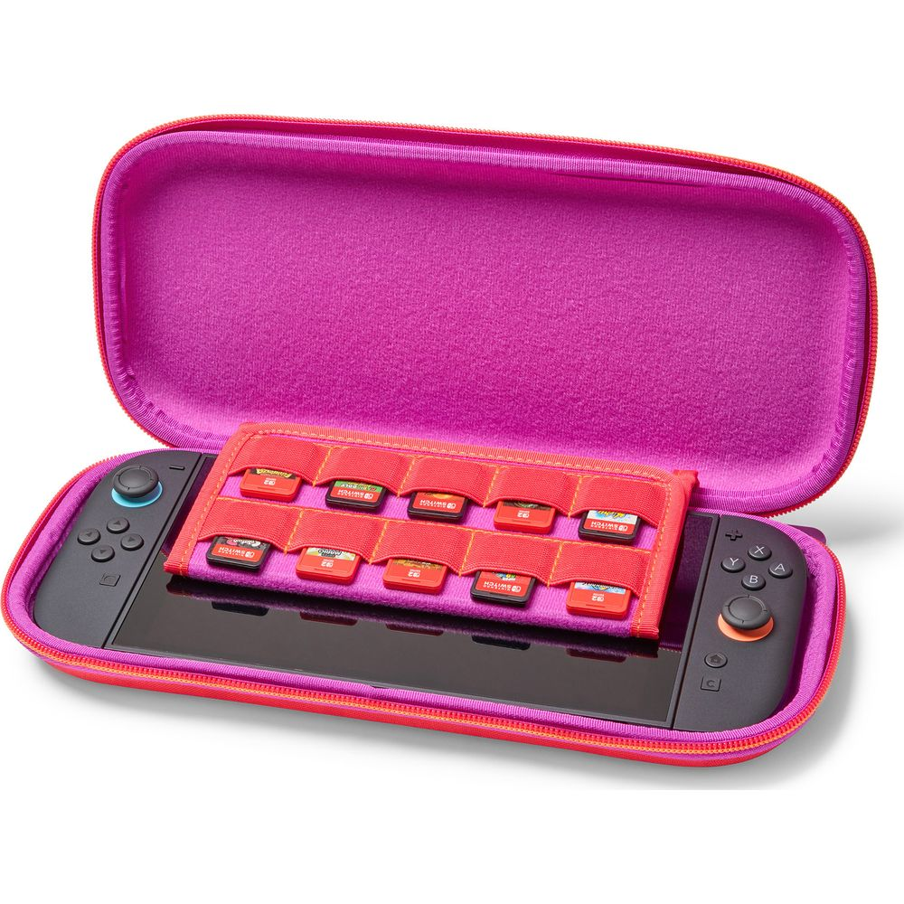 Una custodia rosa per Nintendo Switch con schede di gioco e console.