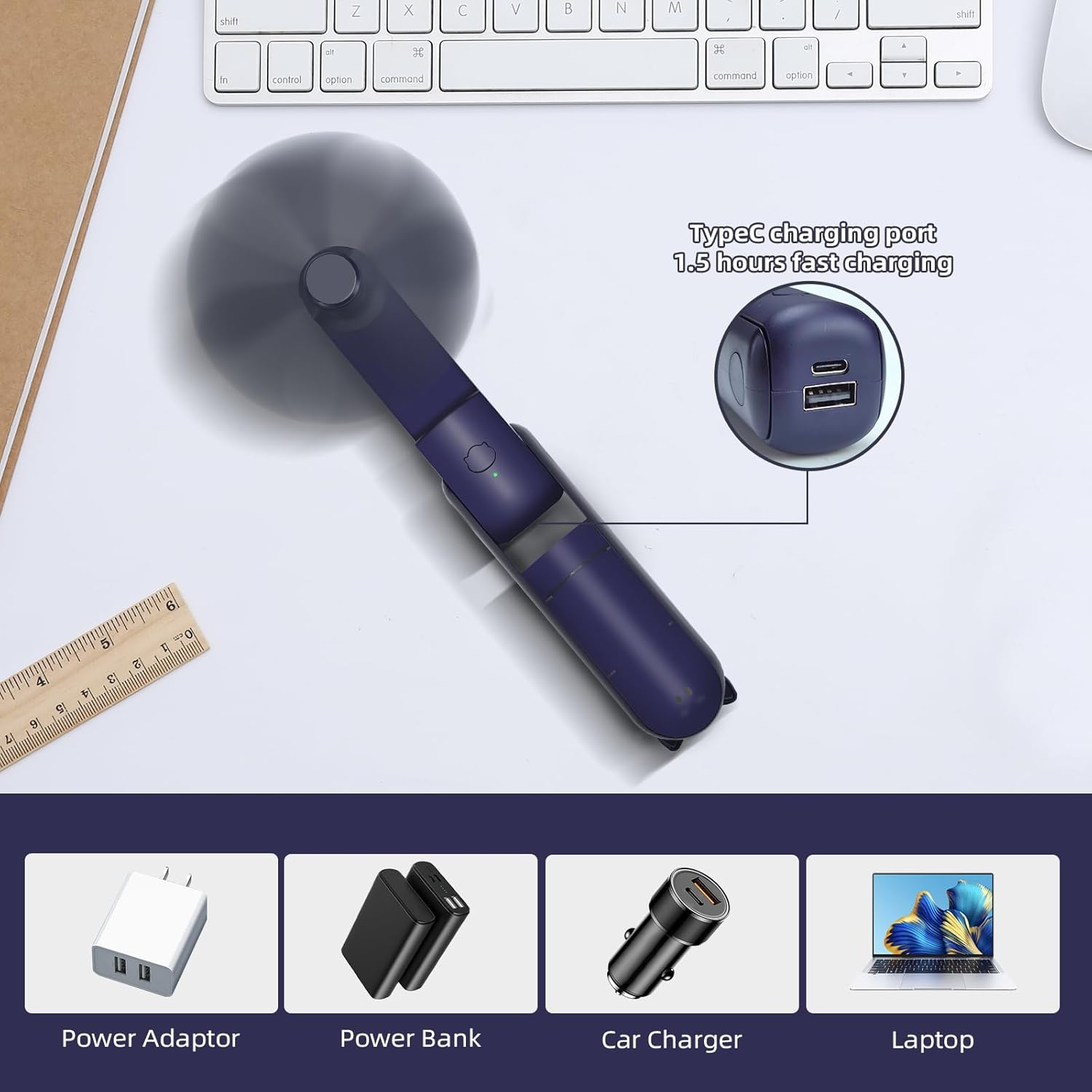 Ein violetter Handventilator liegt neben einer Tastatur. Unten sind Ladezubehör.