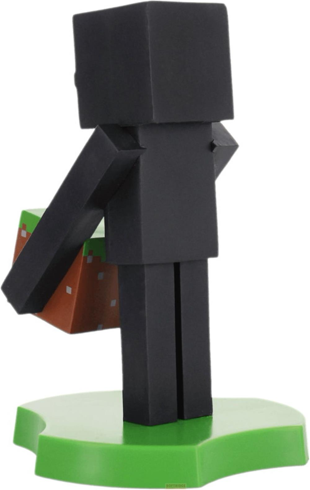 Schwarze Minecraft-Figur hält Block mit grüner Oberseite und brauner Seite.