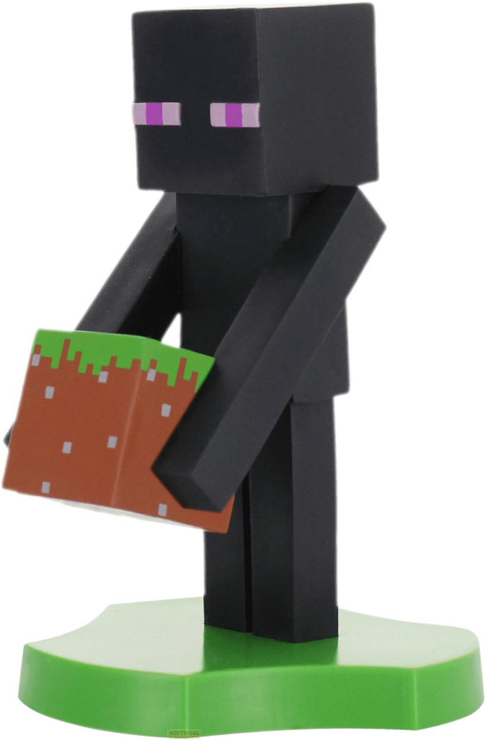 Eine schwarze Minecraft Enderman-Figur hält einen braunen Block mit grüner Oberfläche.
