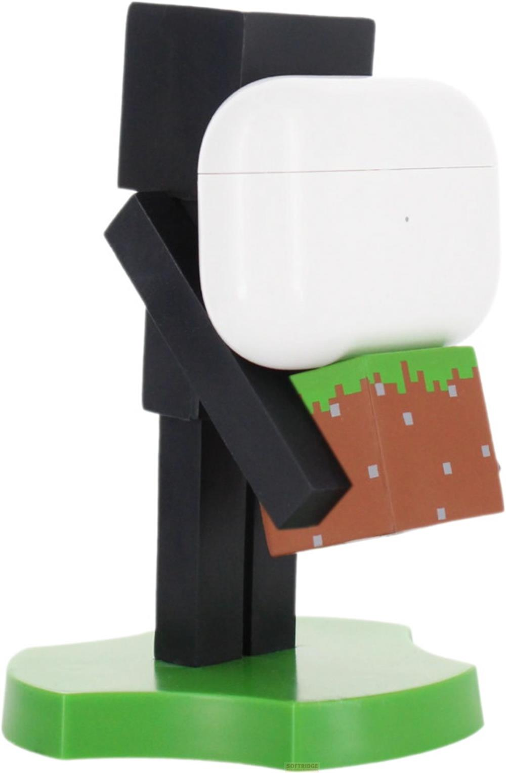Ein schwarzer Minecraft-Charakter hält einen weißen AirPods-Kasten auf einem Grasblock.