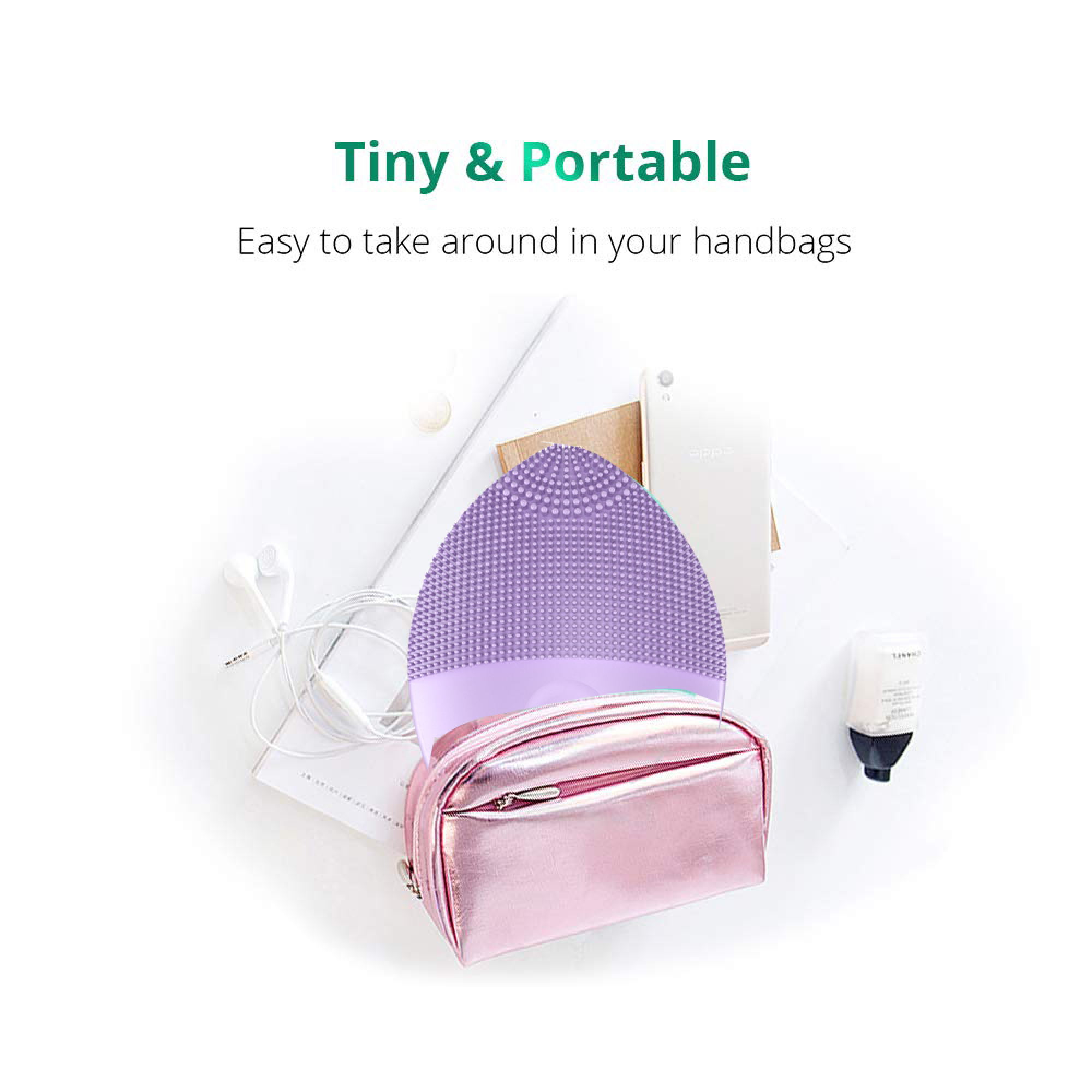 Ein lila Gesichtsreinigungsgerät mit rosa Kosmetiktasche, Kopfhörern und Handy.