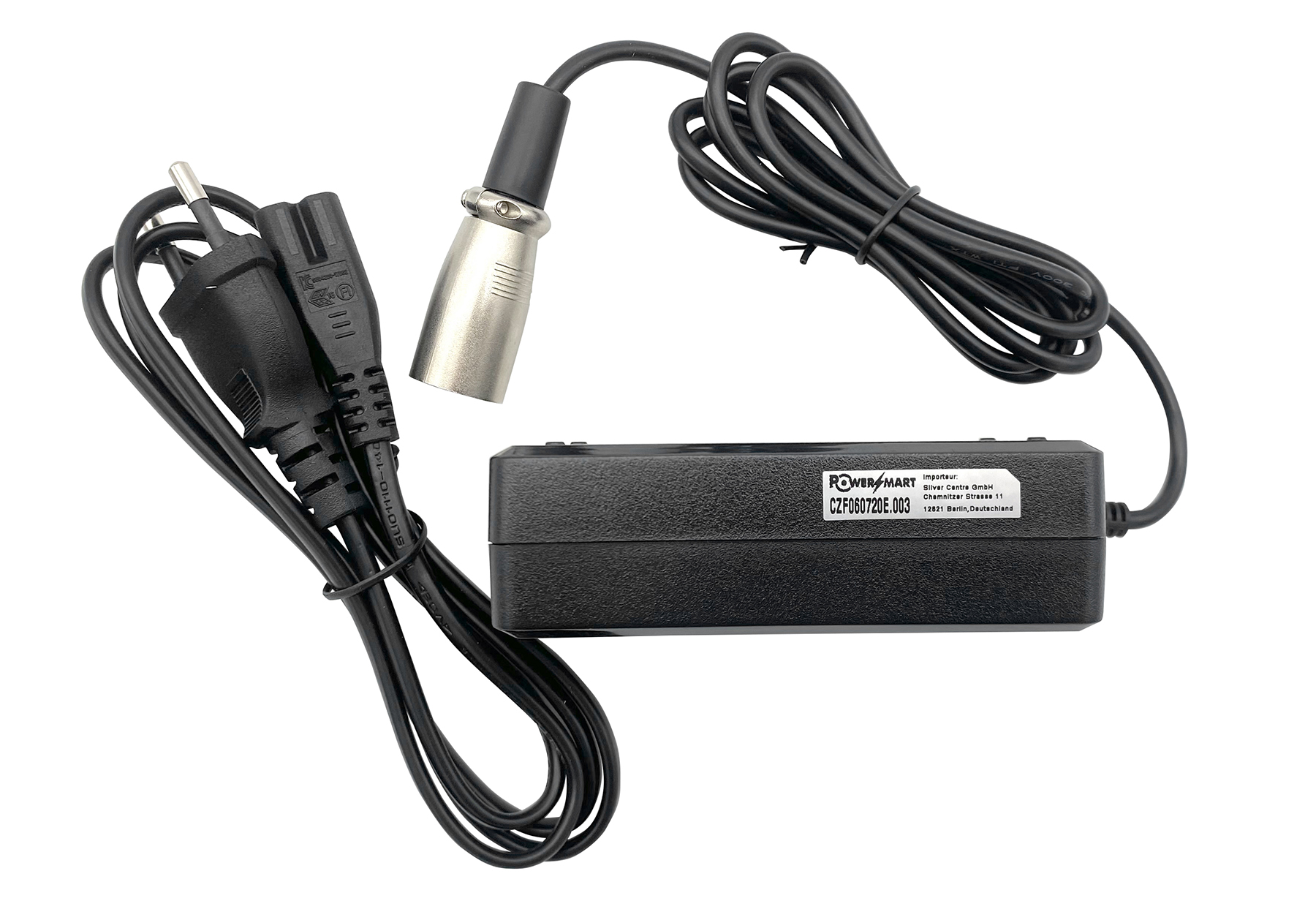 Schwarzes Netzteil mit Kabeln und XLR-Stecker.