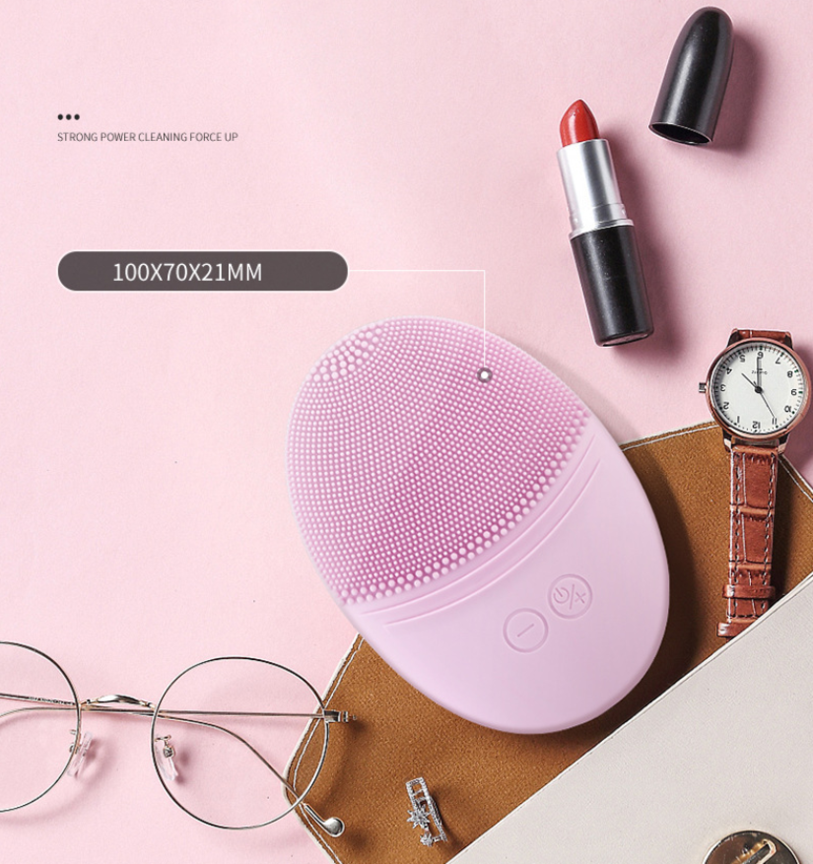 Rosa Gesichtsreinigungsbürste, roter Lippenstift, Brille und Uhr auf rosa Untergrund.
