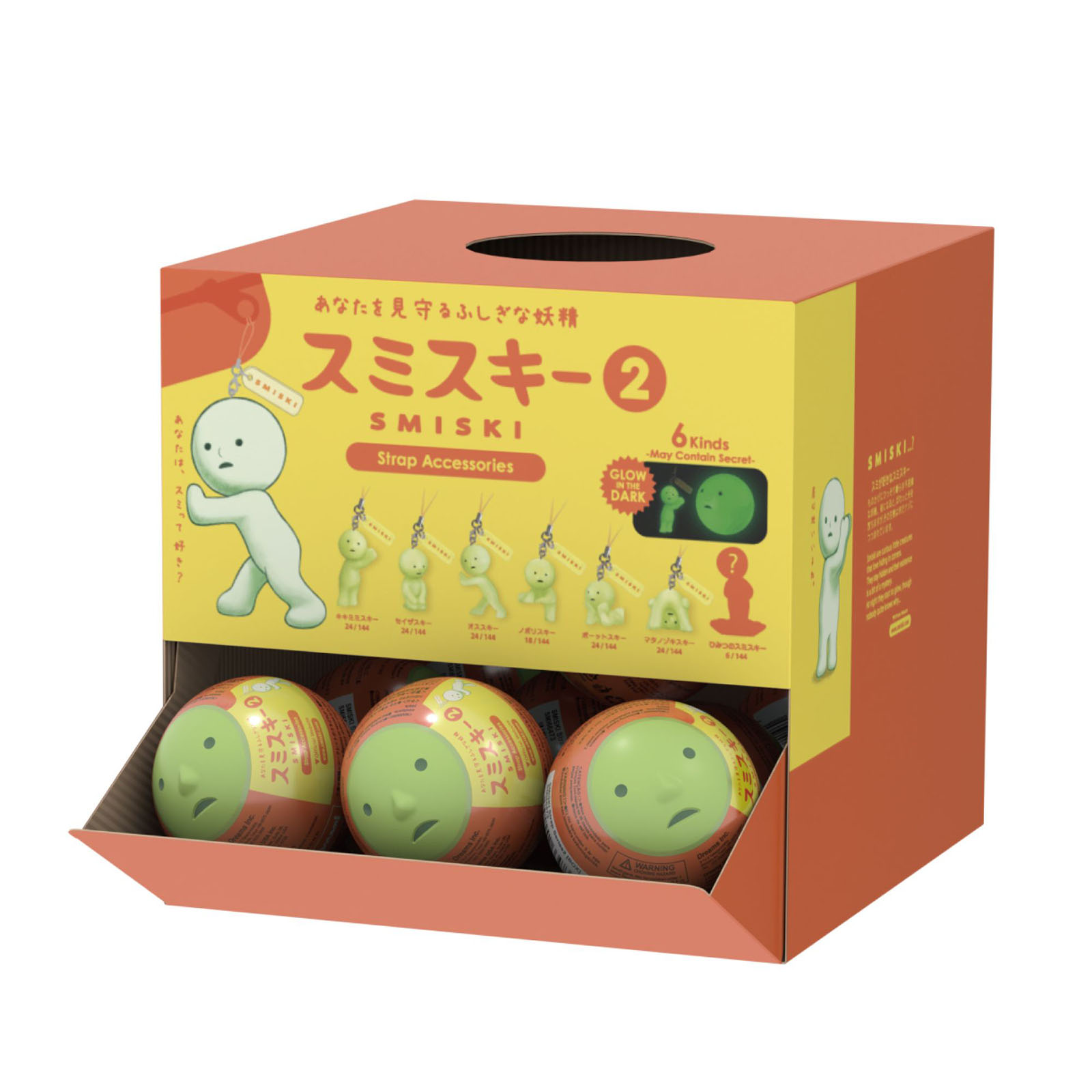 Verpackung mit Smiski-Figuren und Kugeln, die leuchten.