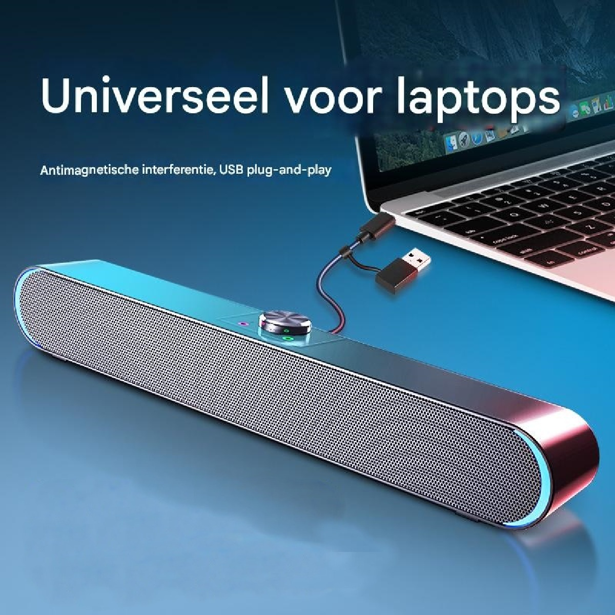 Ein schlanker schwarzer Lautsprecher ist über USB mit einem Laptop verbunden.