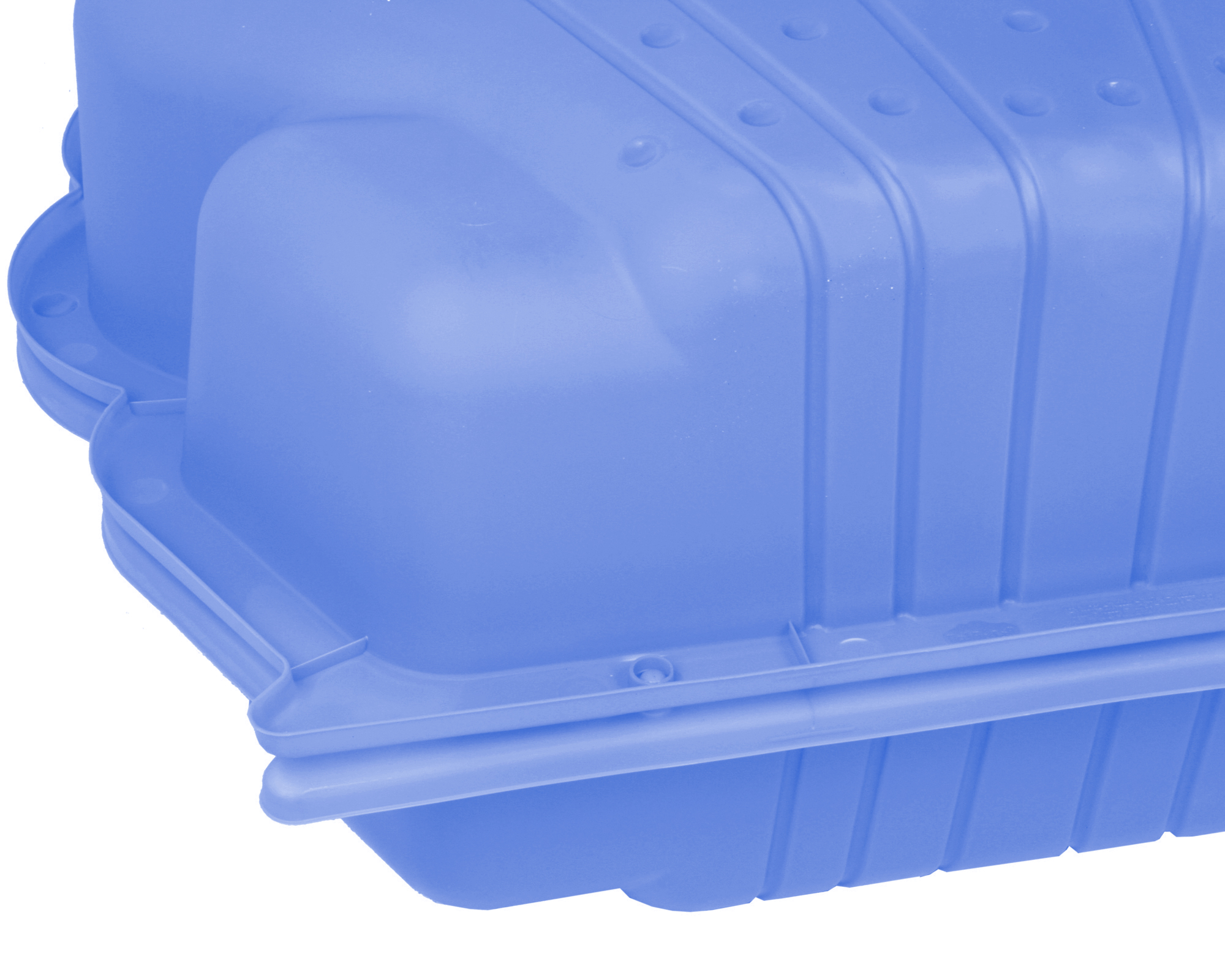 Eine blaue Plastikbox mit vertikalen Rillen und runden Erhebungen.