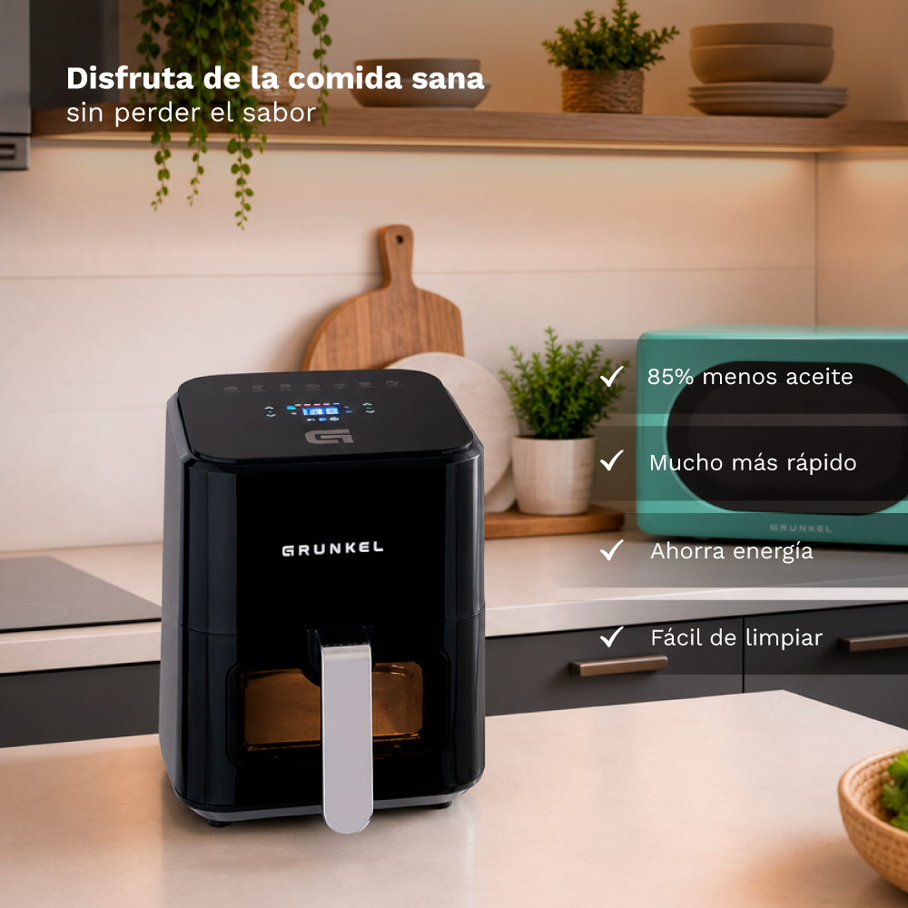 Una freidora de aire Grunkel negra con controles digitales y asa plateada en una encimera.