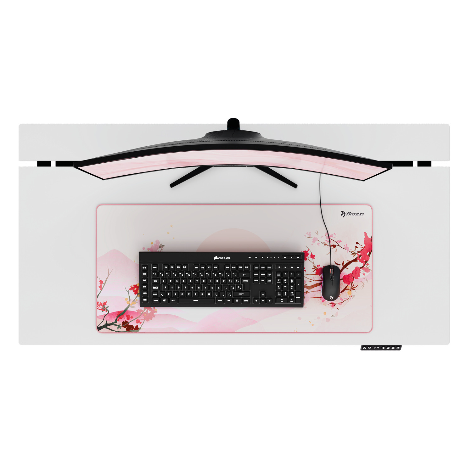 Ein gebogener Monitor sitzt über einer Schreibtischunterlage mit Kirschblütendesign, Tastatur und Maus.