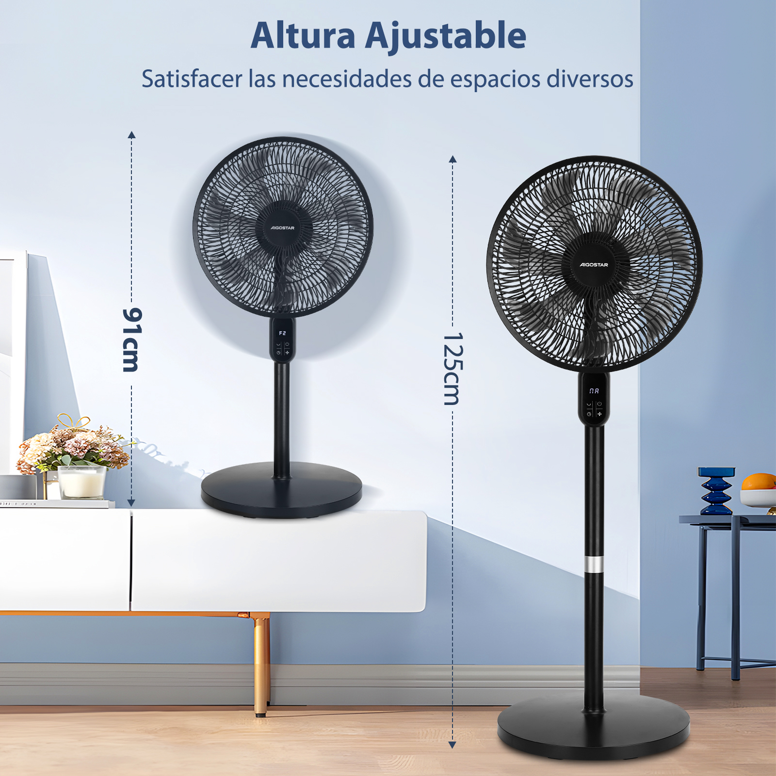 Dos ventiladores negros de pie sobre suelo de madera, uno de 91cm, el otro de 125cm.