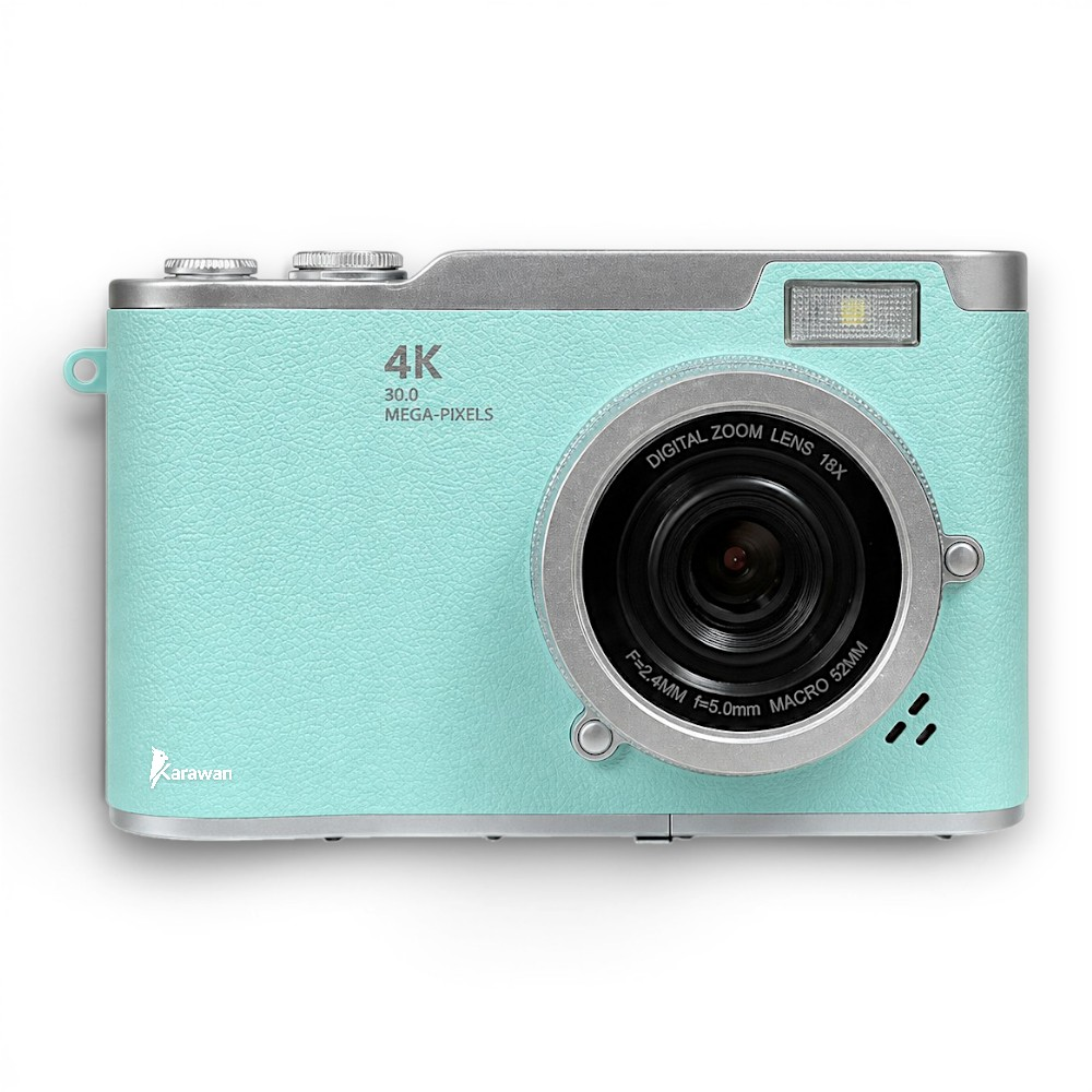 Una cámara digital verde menta con detalles plateados y lente zoom 18x.