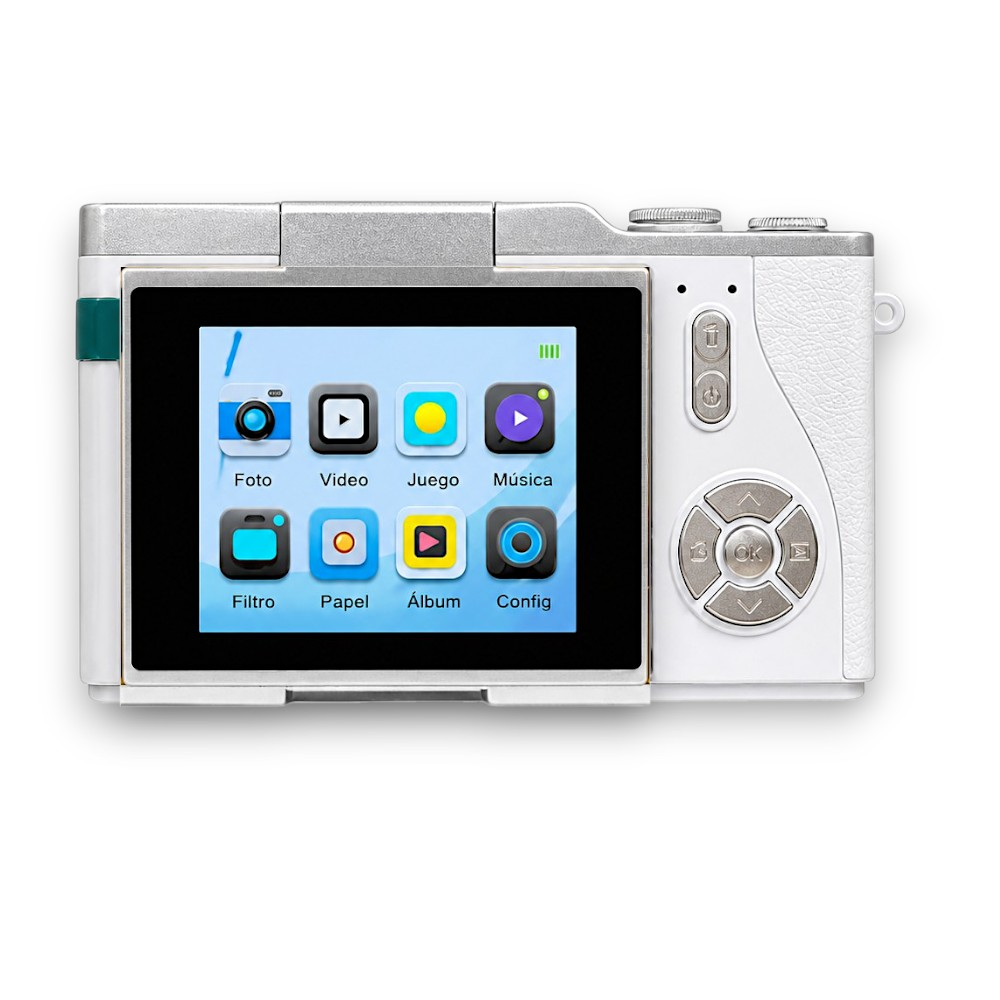 Cámara digital blanca con pantalla táctil, mostrando iconos de apps como Foto, Video, Música.