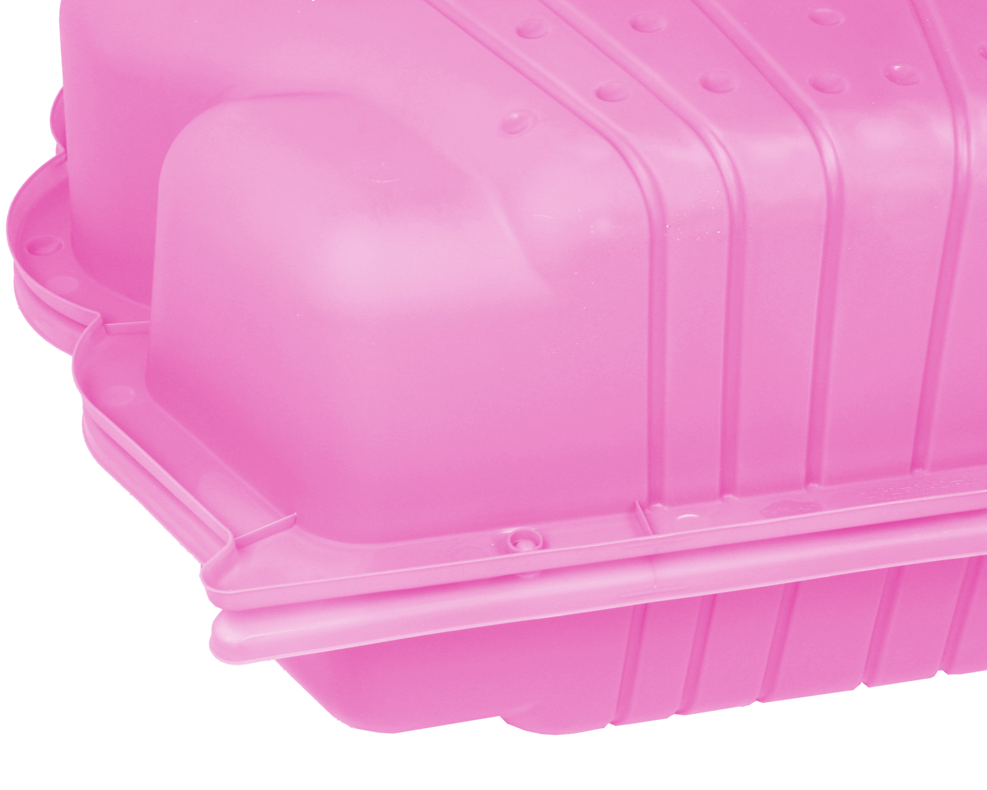 Ein rosafarbener Plastikbehälter mit gerillten Seiten und kleinen Noppen.
