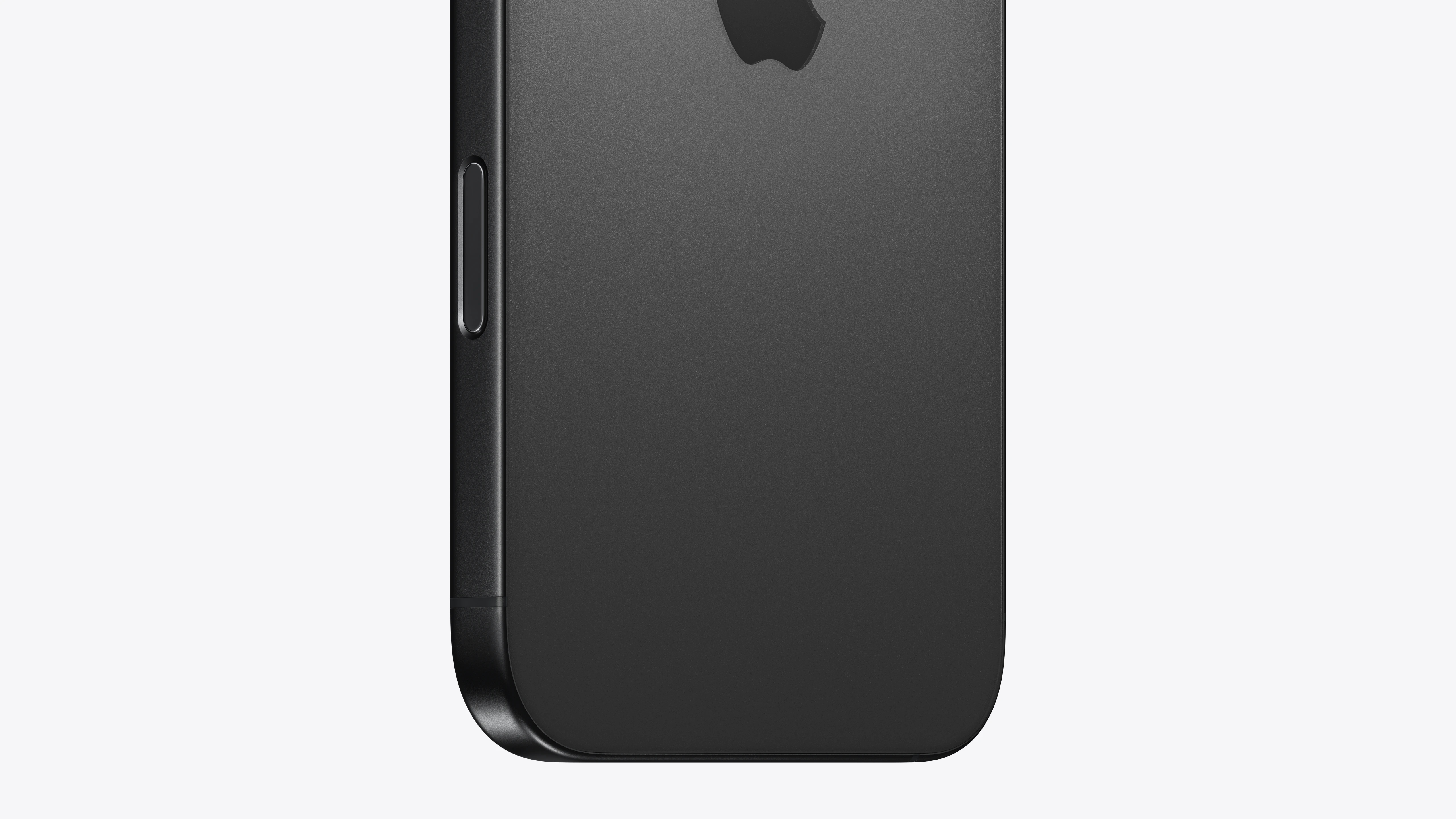Primer plano de un smartphone gris oscuro con parte trasera texturizada y logo brillante de Apple.