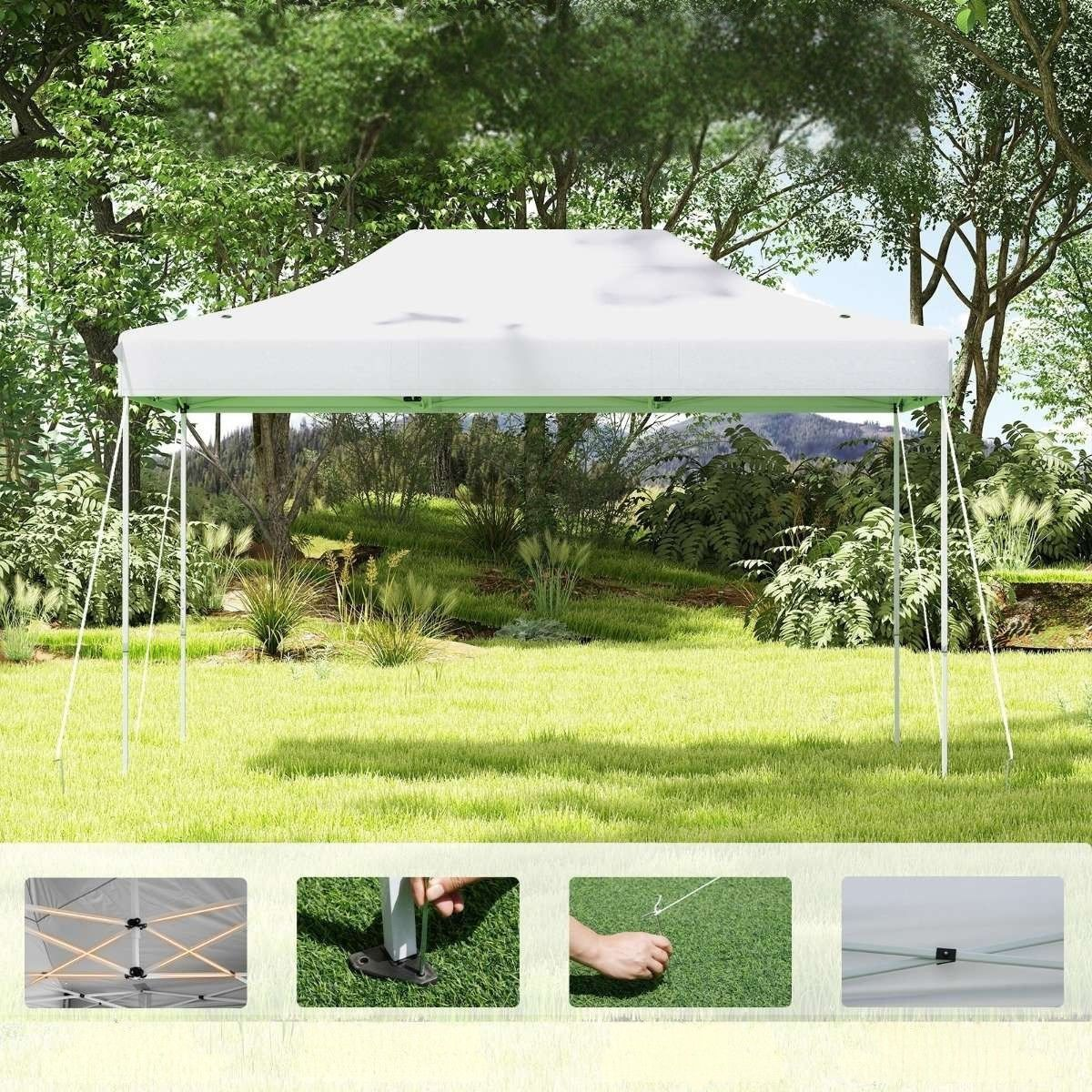 Witte tent met groene rand, opgesteld op een grasveld met bomen en struiken.
