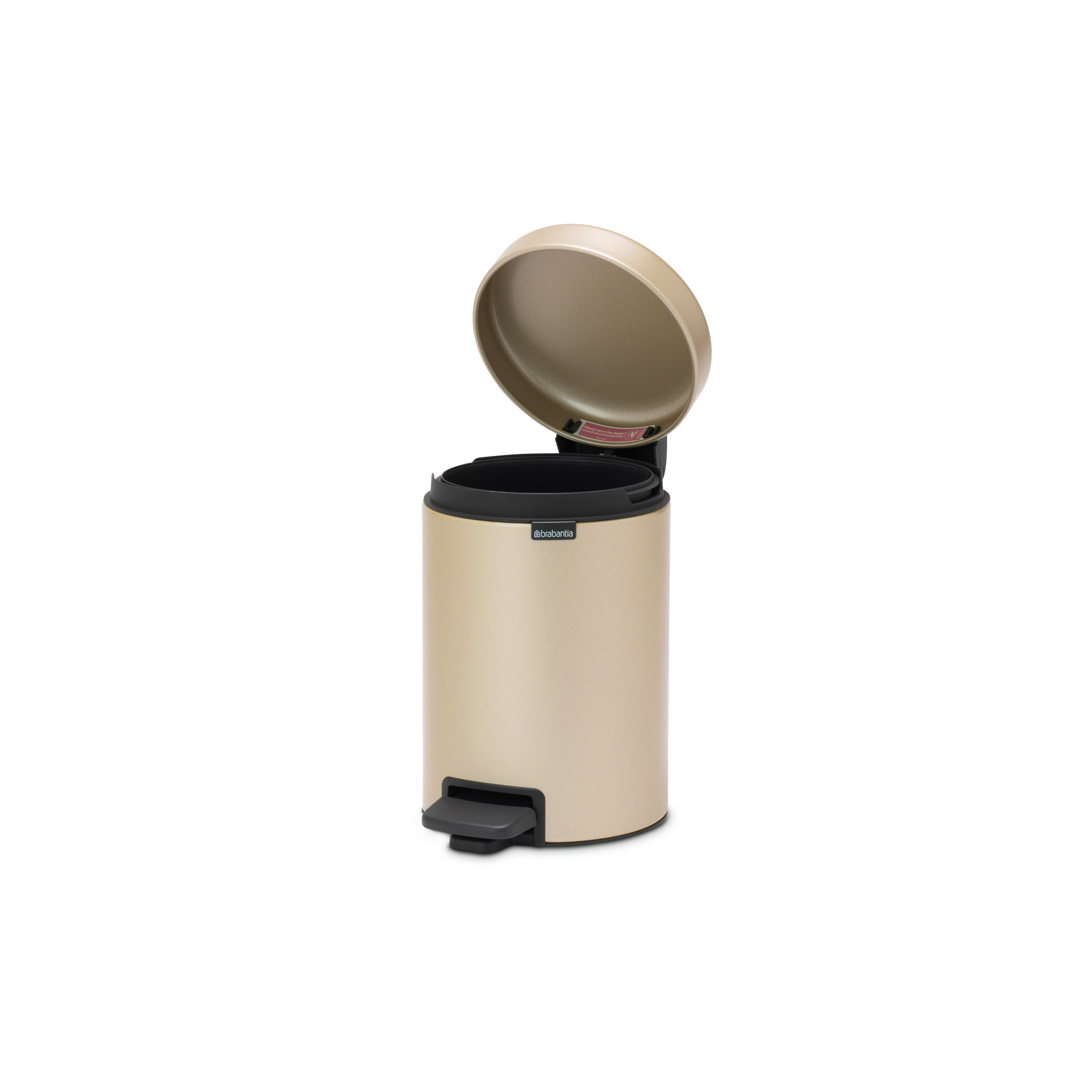 Un cubo de basura beige con la tapa abierta y pedal.