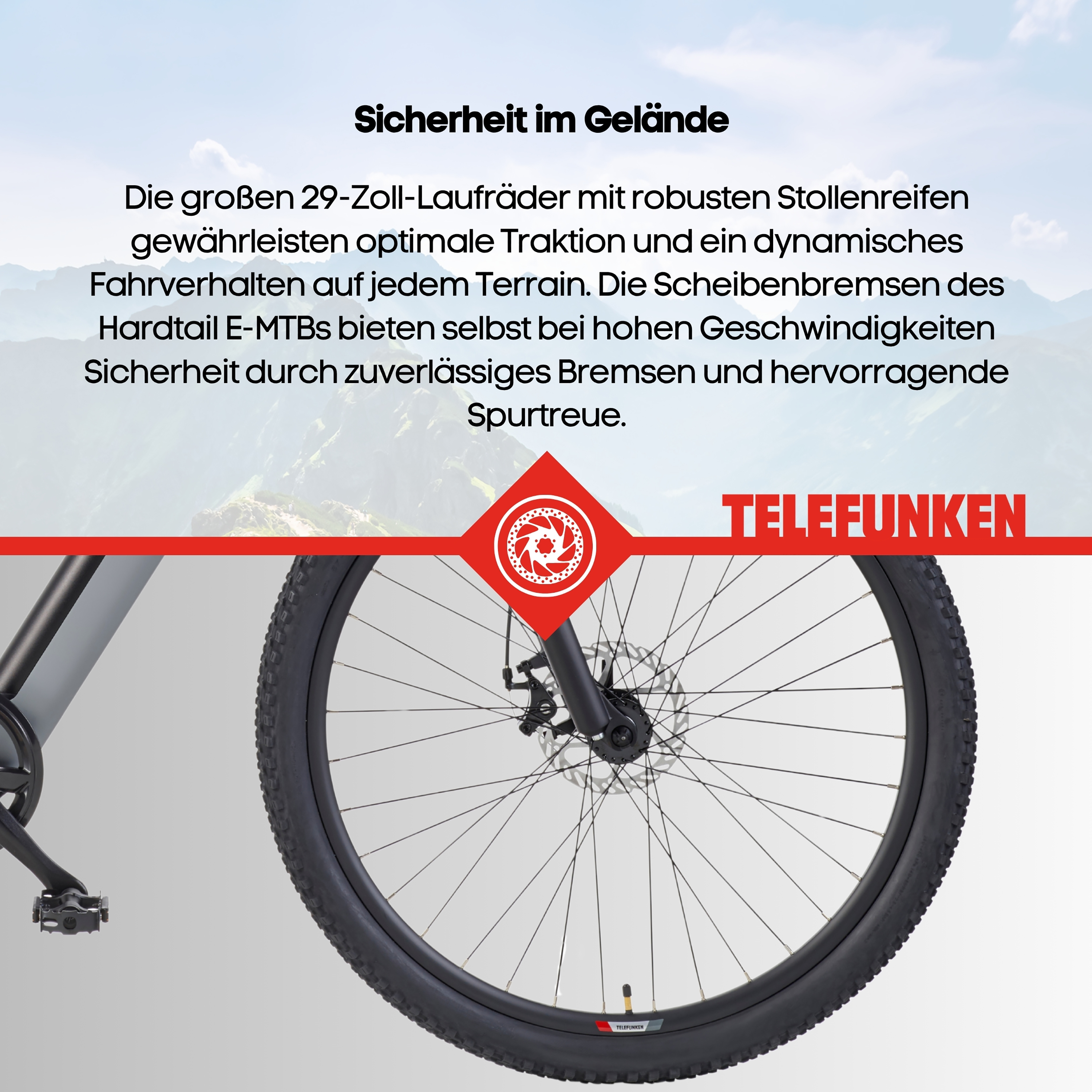 Nahaufnahme eines E-MTB-Rads mit Scheibenbremse vor Bergkulisse.