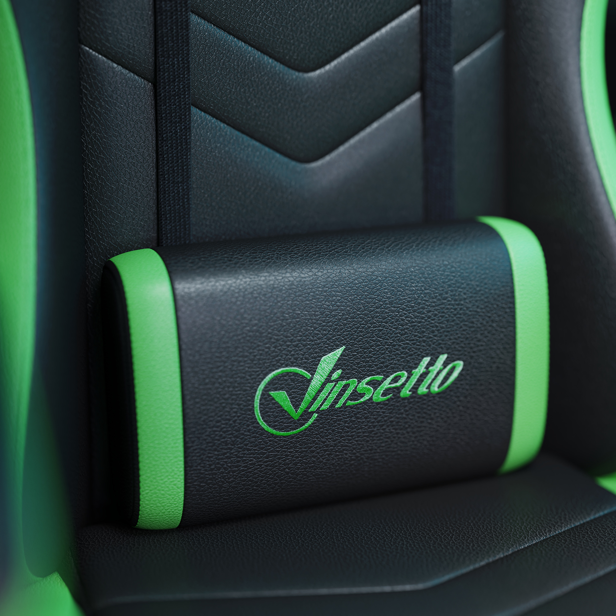 Un cojín negro con detalles verdes y el logo 'Vinsetto'.