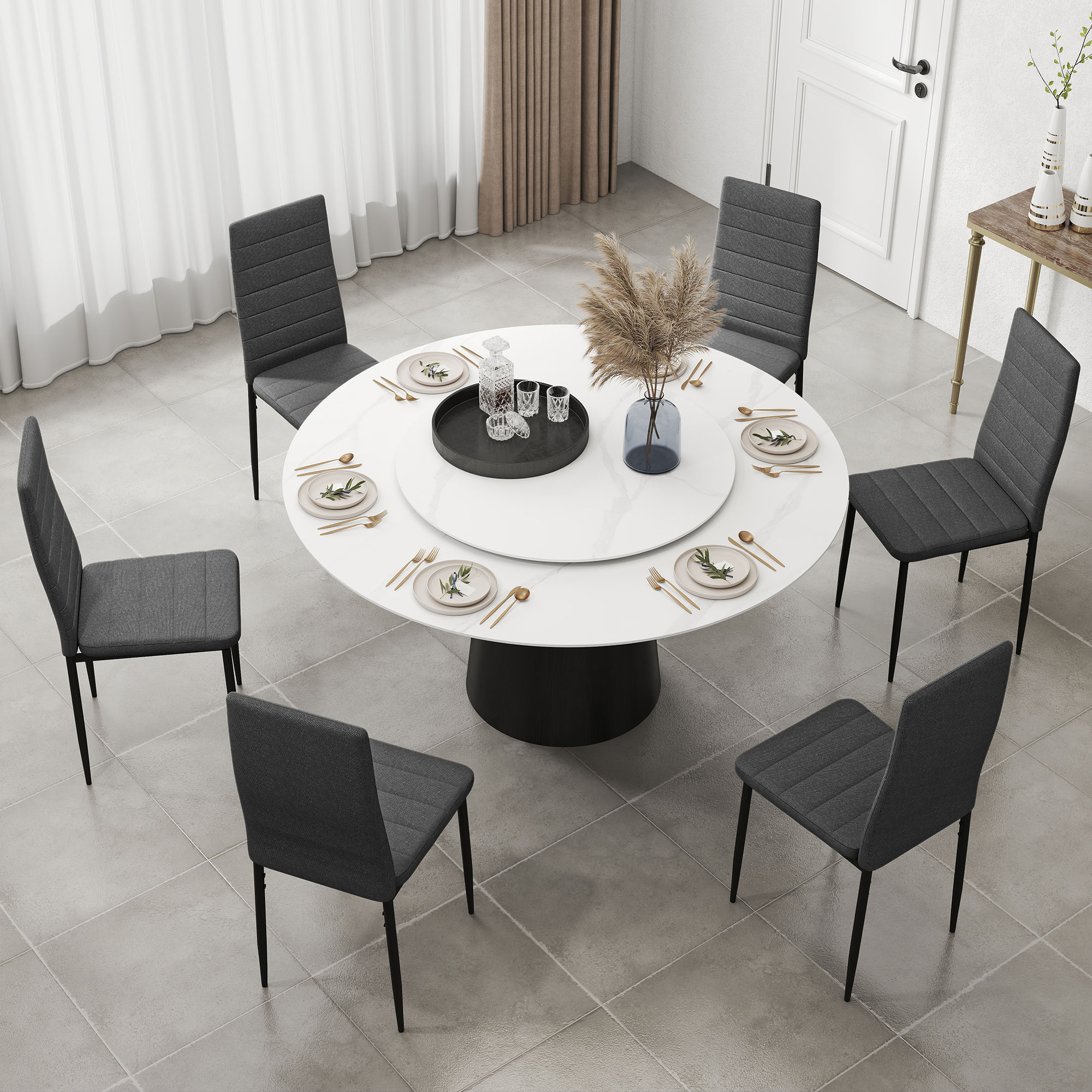 Una mesa de comedor redonda con seis sillas en un comedor.