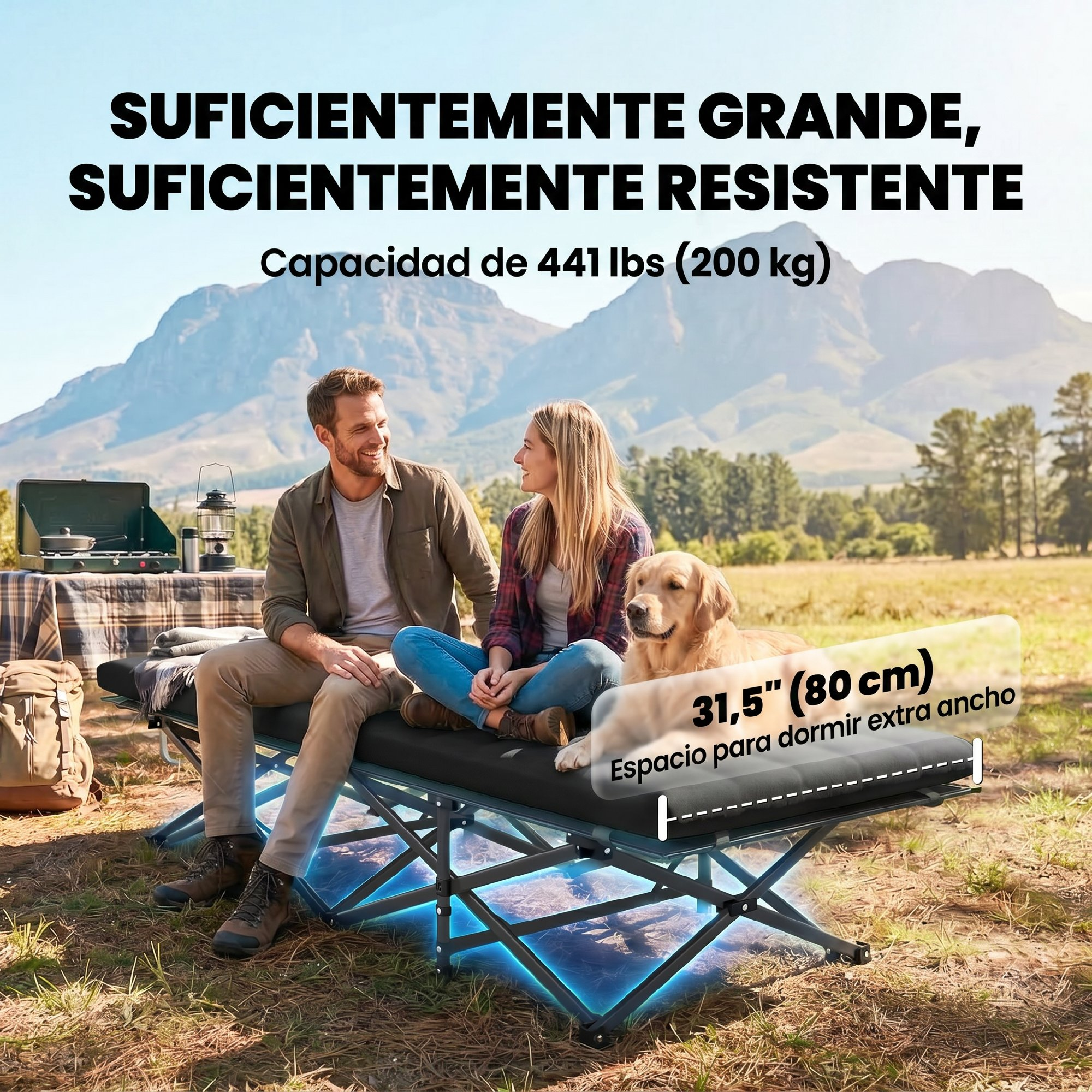 Hombre, mujer y perro sentados en una cama de camping al aire libre con montañas.