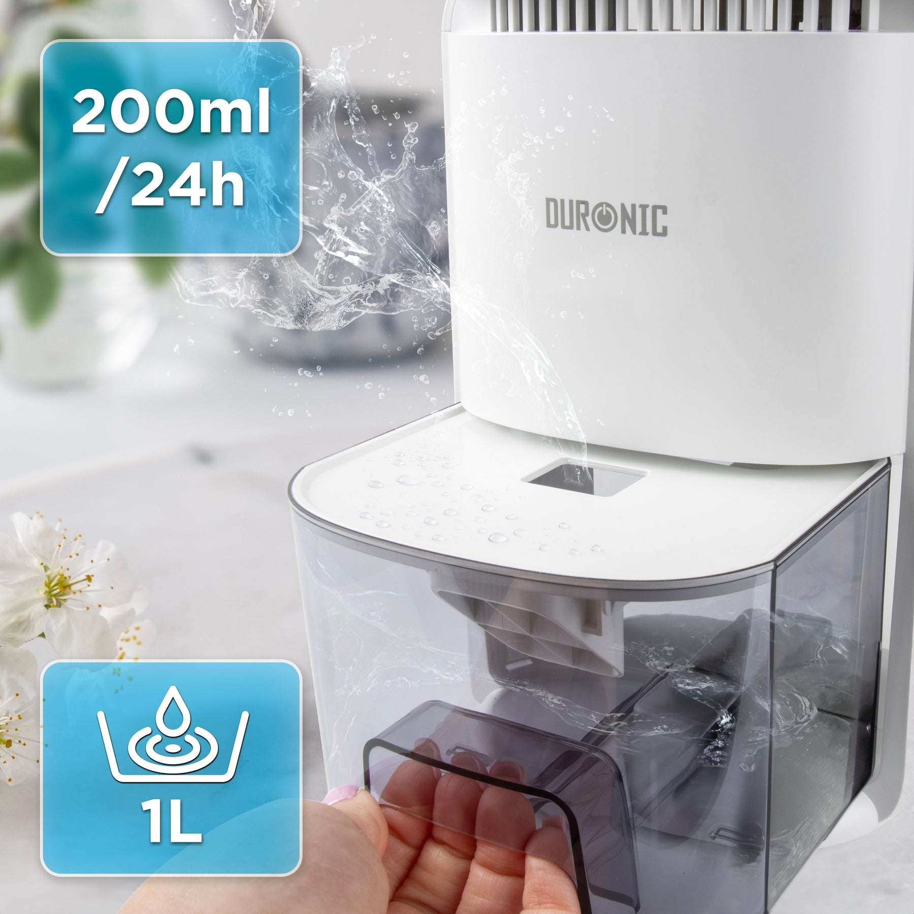 Ein weißer Duropic Luftentfeuchter mit 1L Wassertank, gezeigt mit Wasserspritzern.