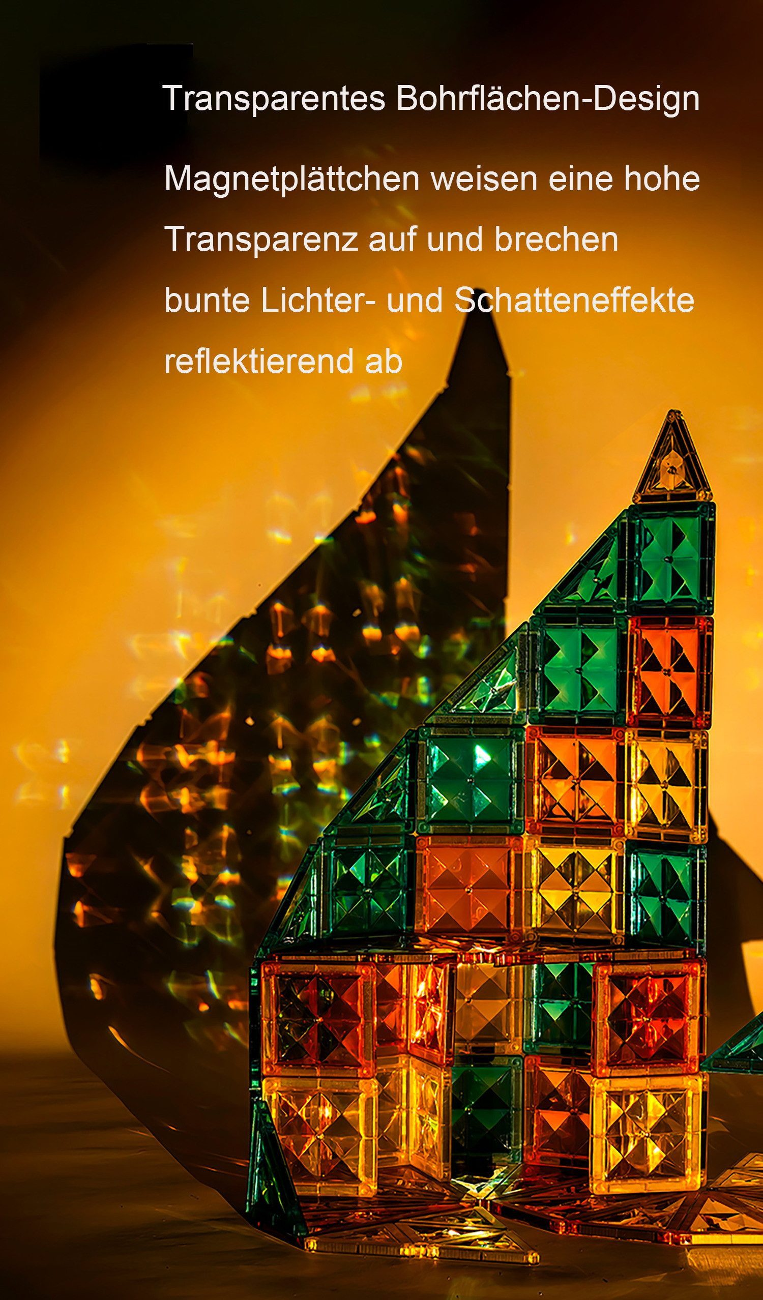 Transparente Magnetbausteine in Grün, Orange und Gelb bauen eine Pyramide mit Lichtreflexionen.