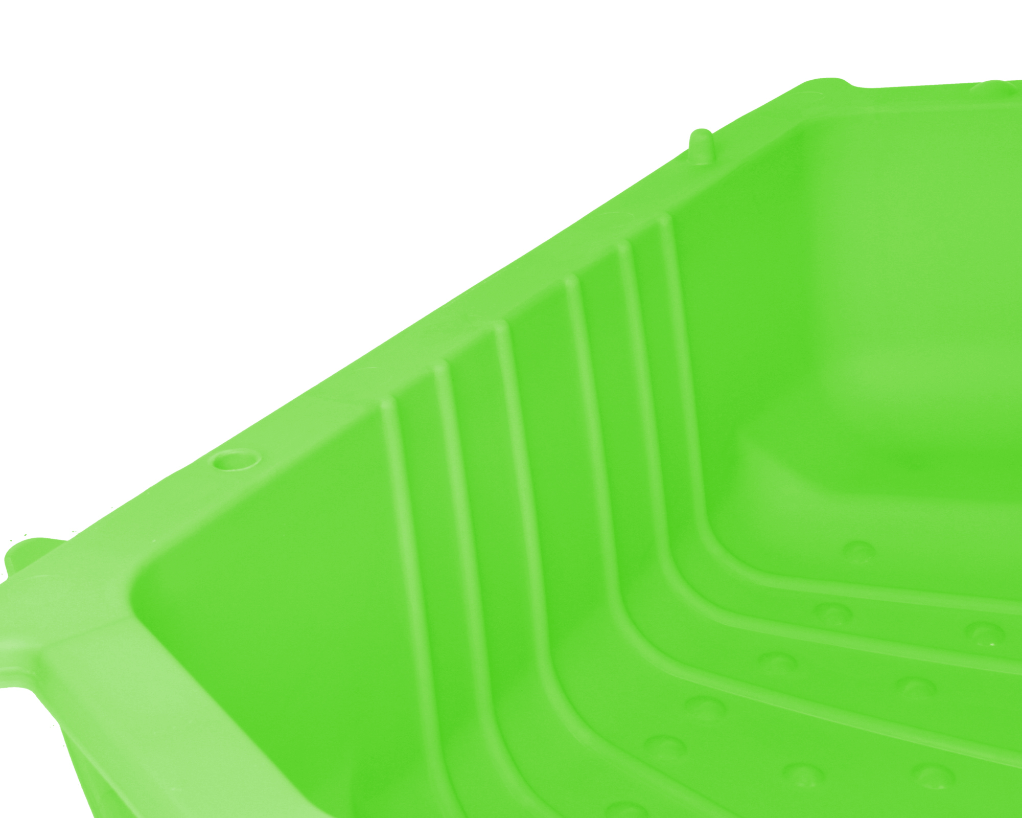 Ein heller, neongrüner Plastikschlitten mit gerillter Innenseite.