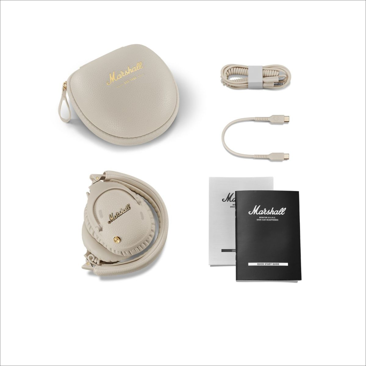 Marshall Kopfhörer, Ladecase, Kabel und Anleitungen auf weißem Hintergrund.