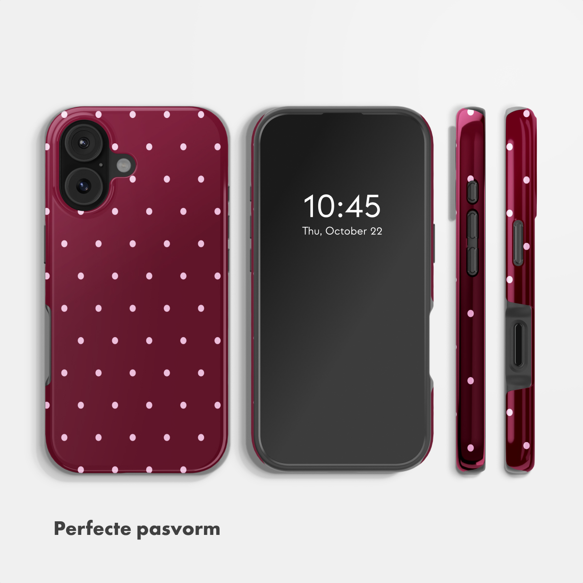 Ein dunkelrotes Handycase mit weißen Punkten, daneben ein Smartphone.