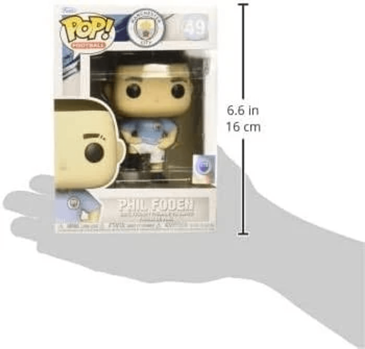 Funko Pop Figur von Phil Foden im Manchester City Trikot, in der Hand gehalten.